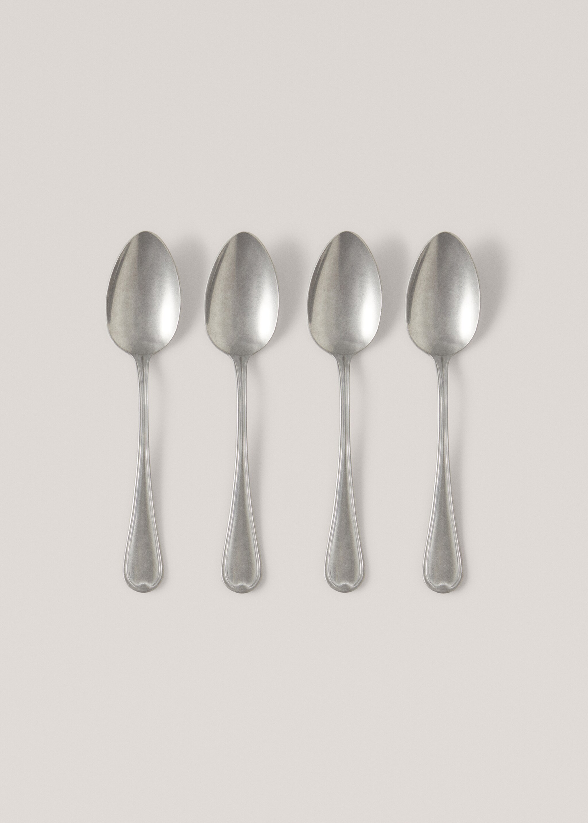 Pack of 4 old silver dessert spoons - Article without model