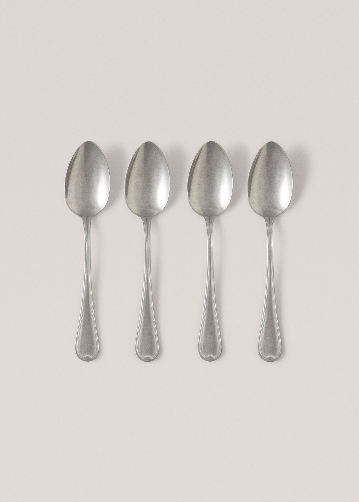 Pack of 4 old silver dessert spoons - Article without model
