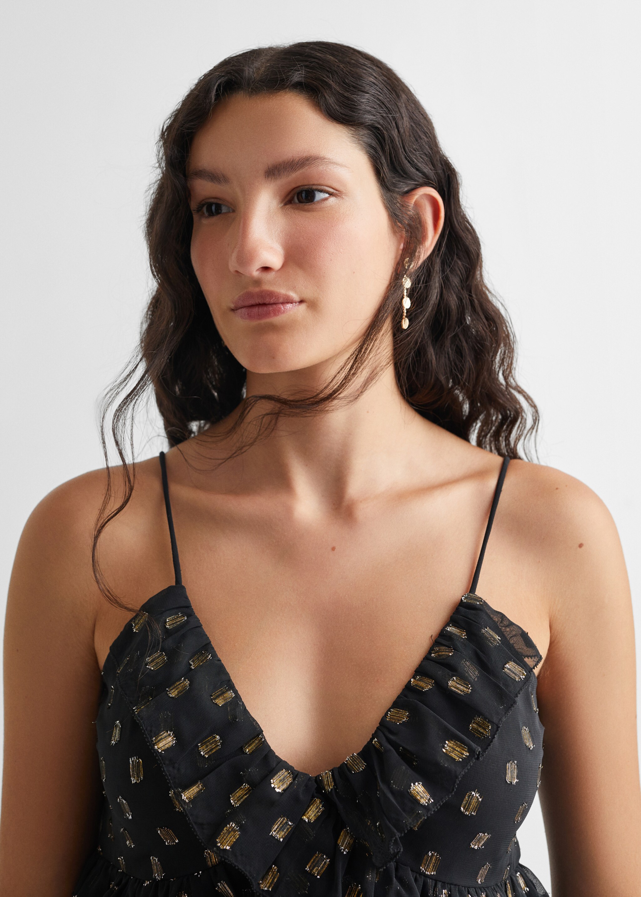 Lurex ruffled top - Details of the article 1, Black. Ref: 57024425-00.