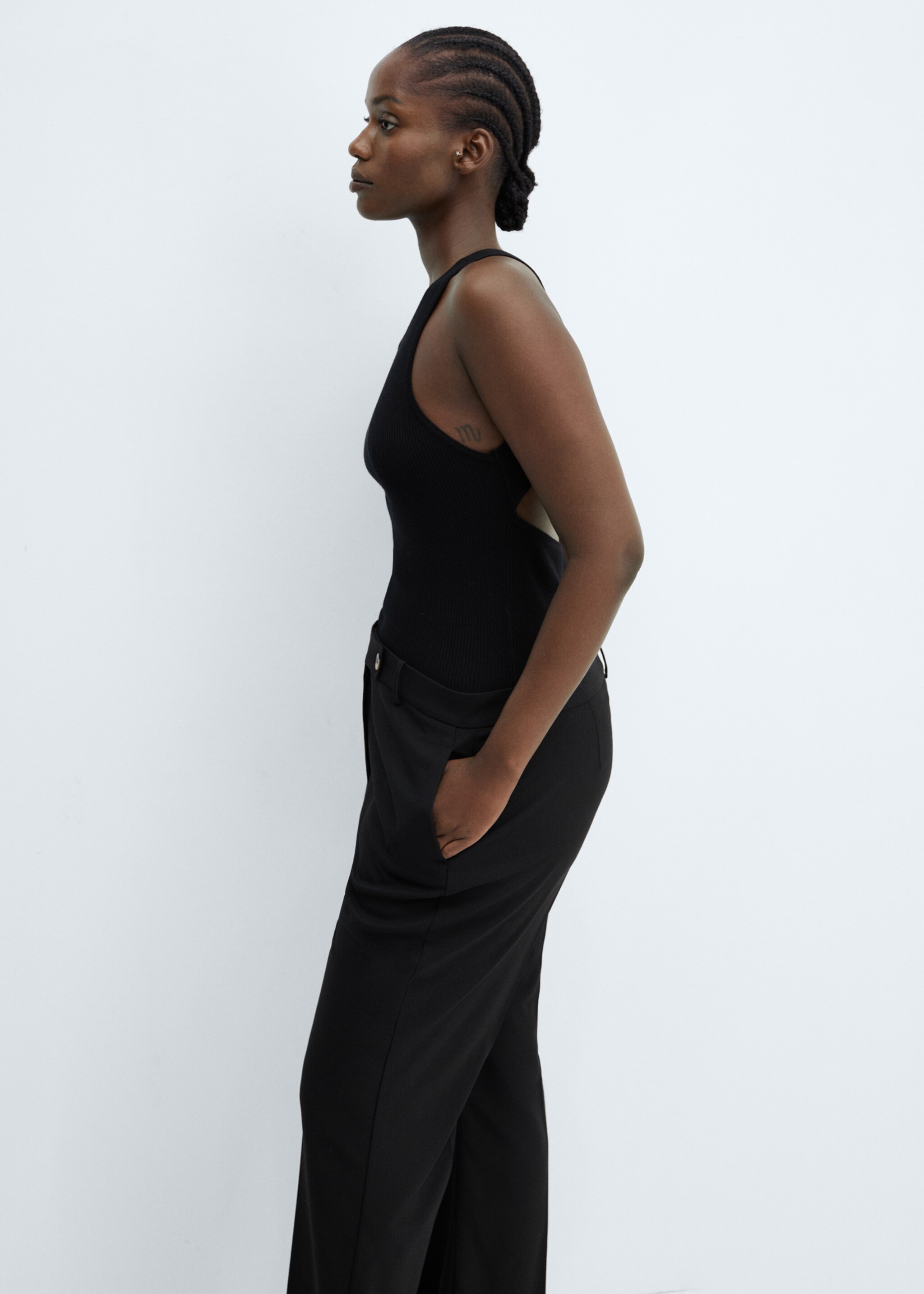 Straight trousers with side button - Details of the article 4, Black. Ref: 57026727-00.