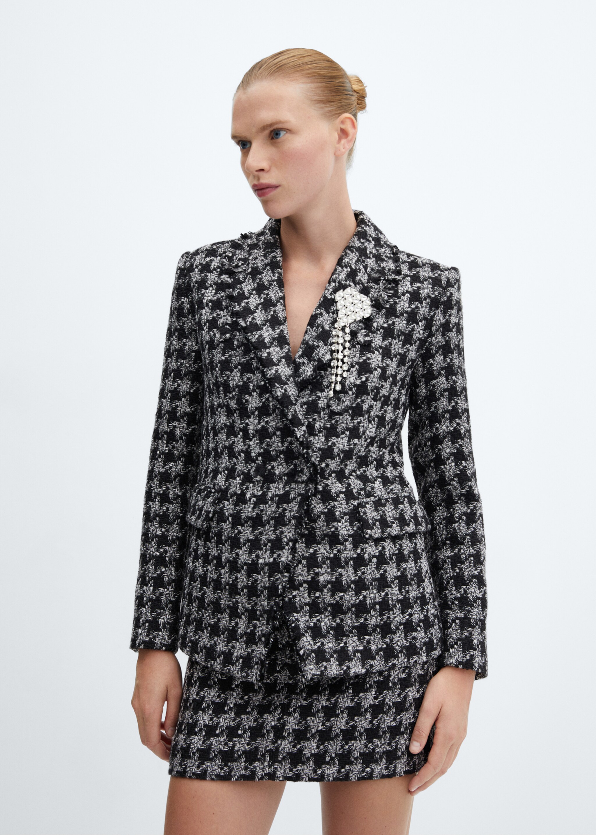 Dress-miniskjørt i tweed - Halvtotal bildeutsnitt