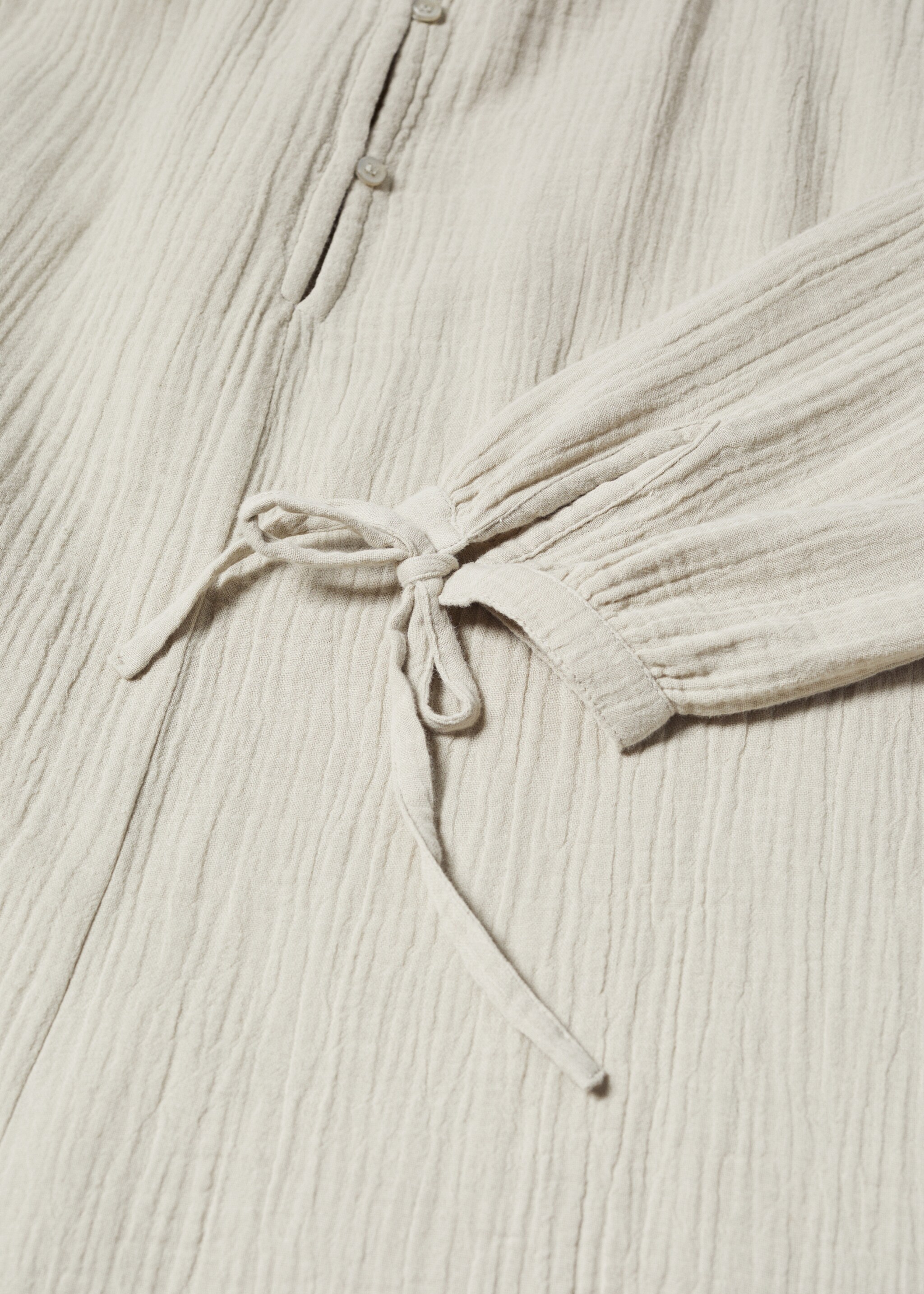 Short jumpsuit with buttons - Details of the article 8, Light/Pastel Grey. Ref: 57040034-00.