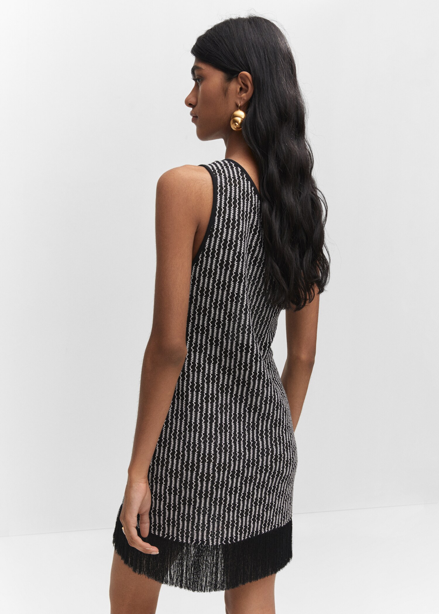 Asymmetrical dress with fringe detail - Reverse of the article