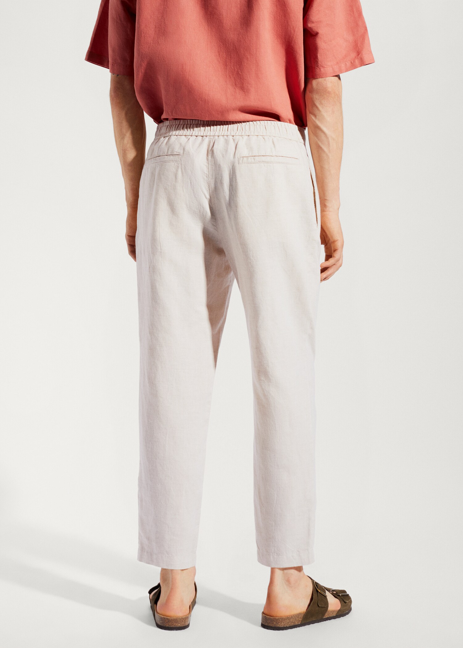 Slim-fit trousers with drawstring - Reverse of the article