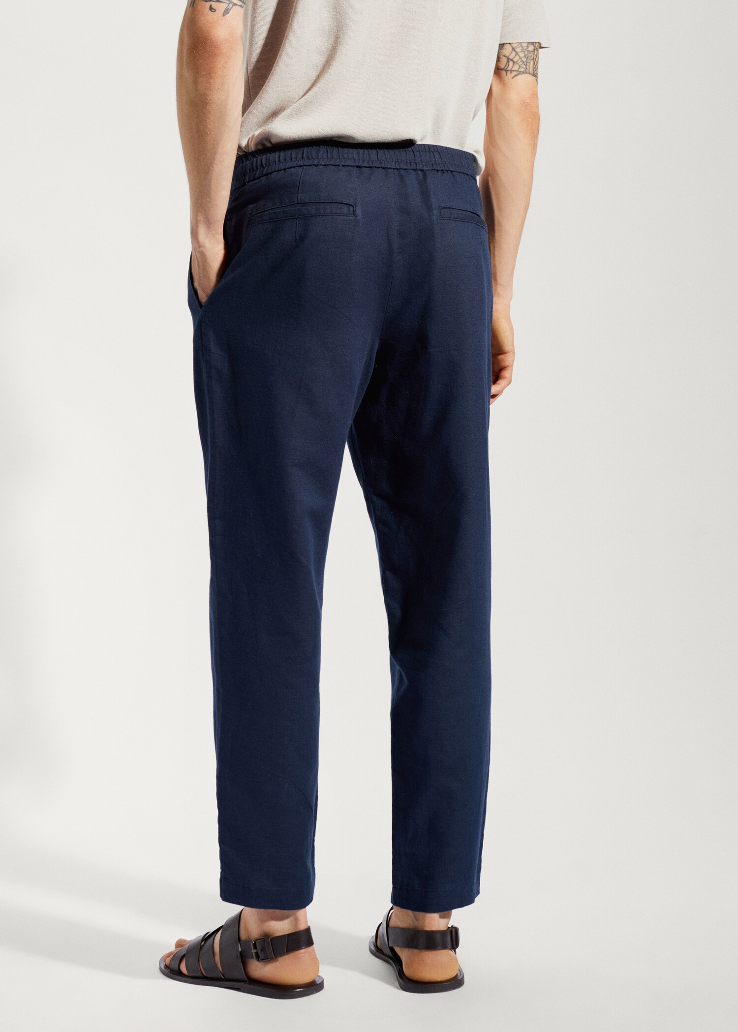 Slim-fit trousers with drawstring - Reverse of the article