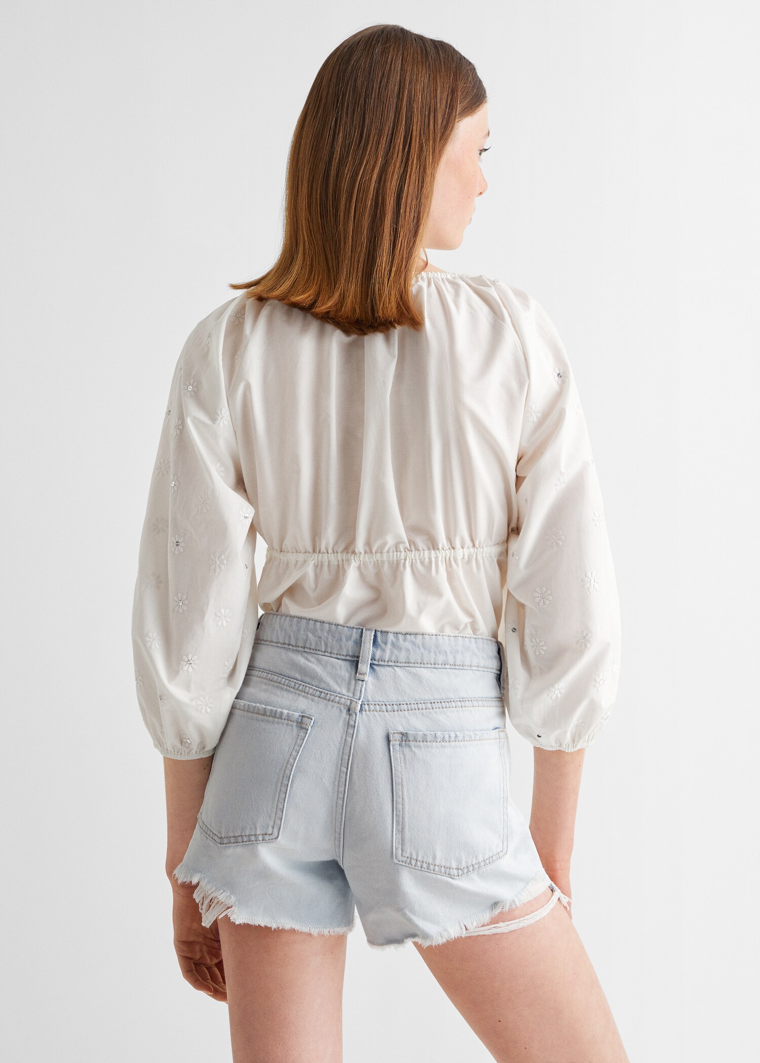 Broken denim shorts - Reverse of the article