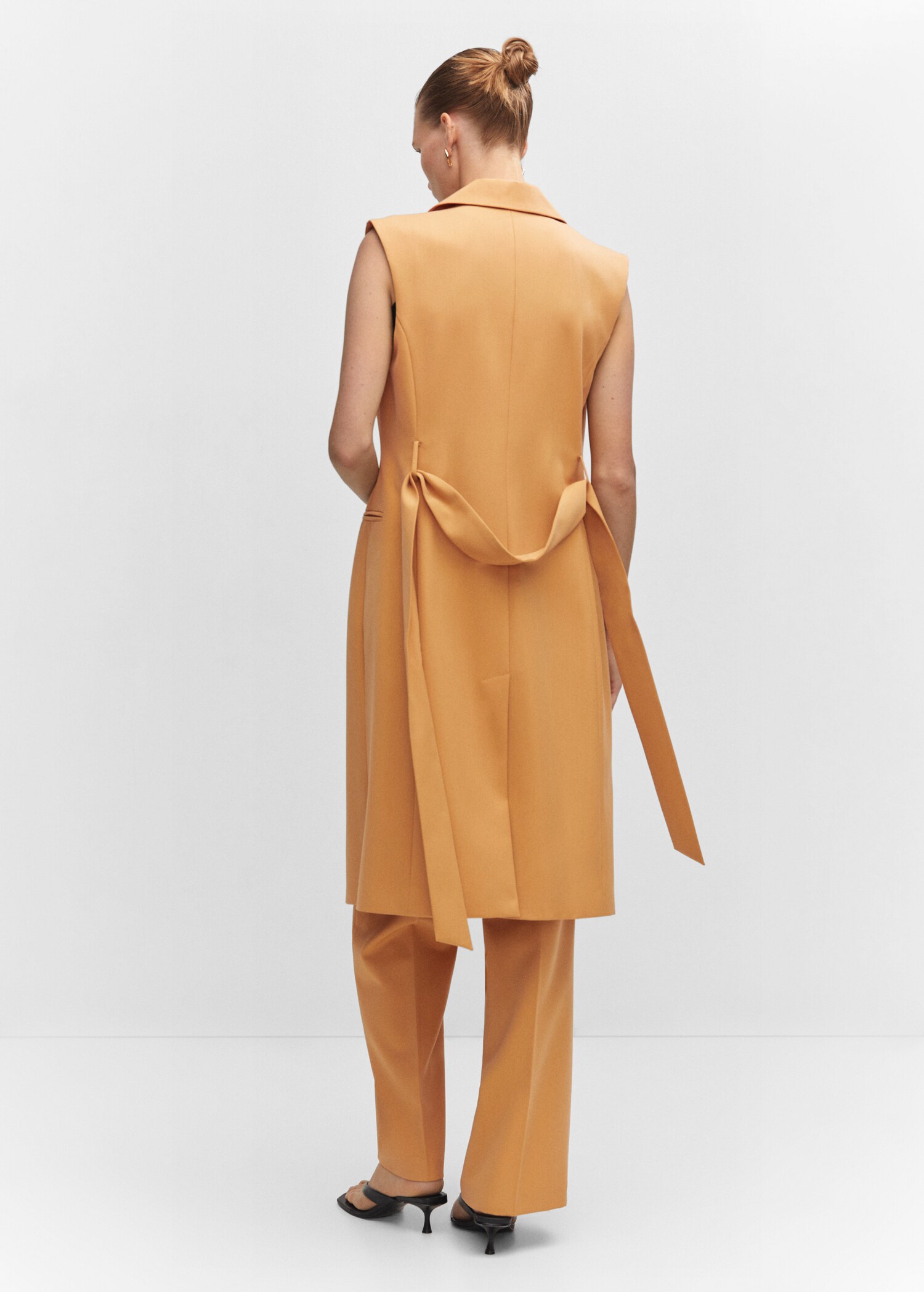 Long gilet with bow - Reverse of the article