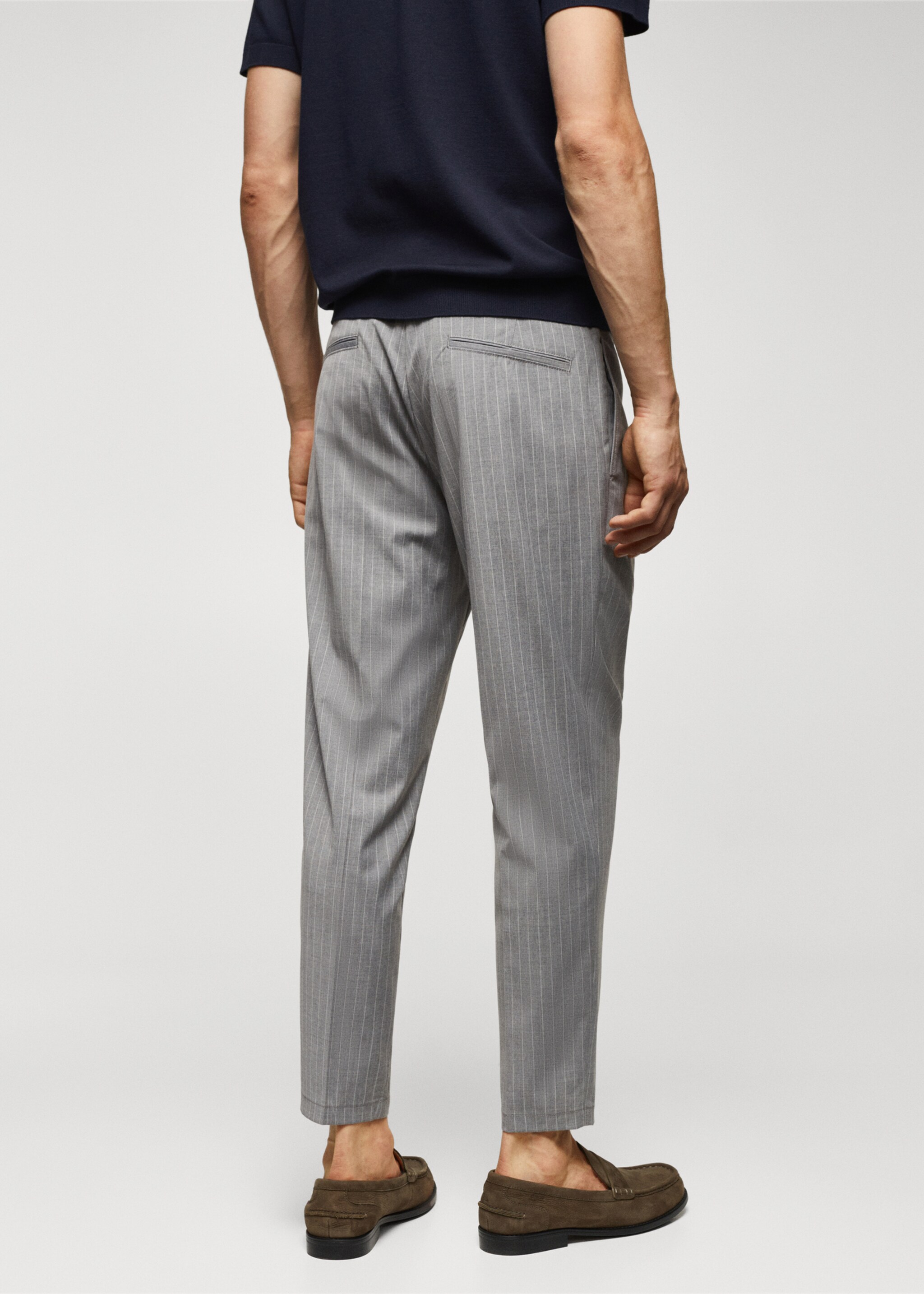 Printed pleated trousers - Reverse of the article