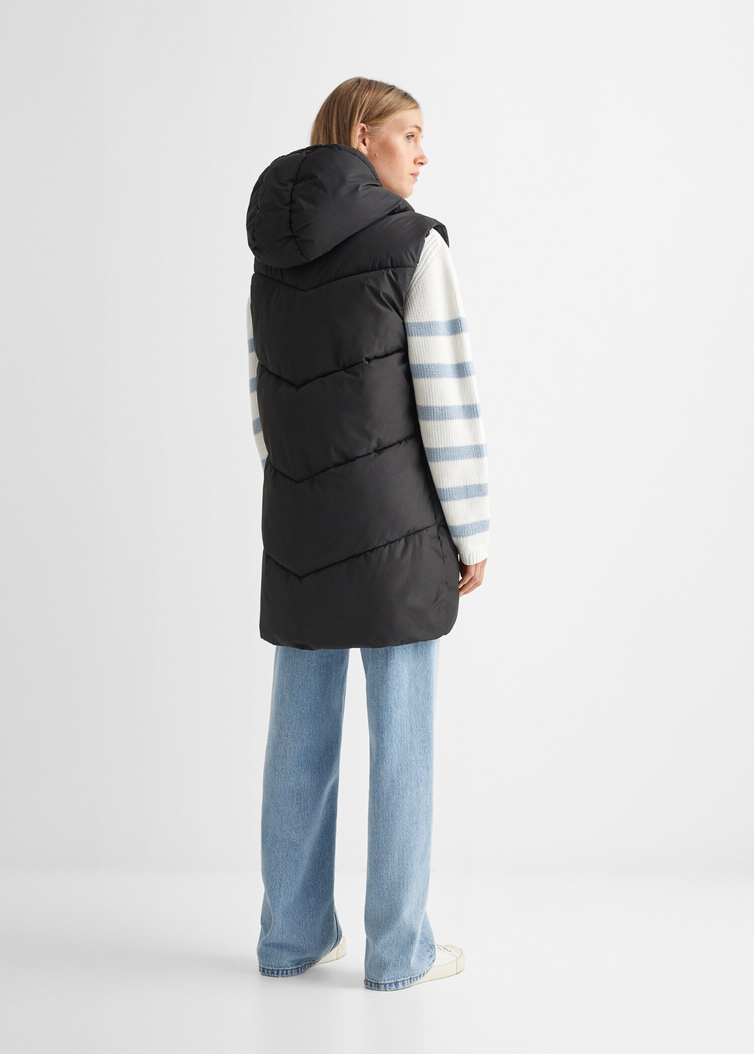 Long quilted gilet - Reverse of the article