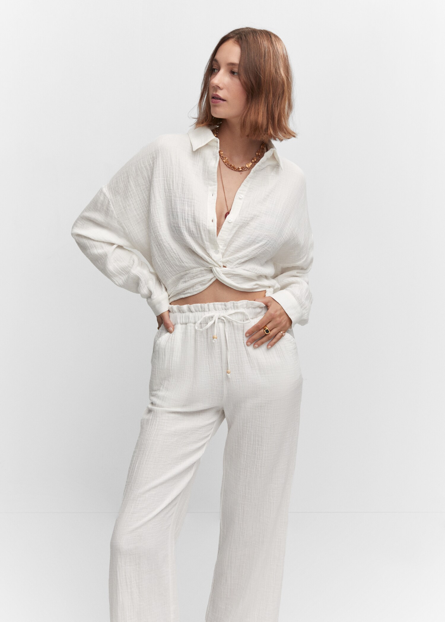 Bow textured trousers - Details of the article 1