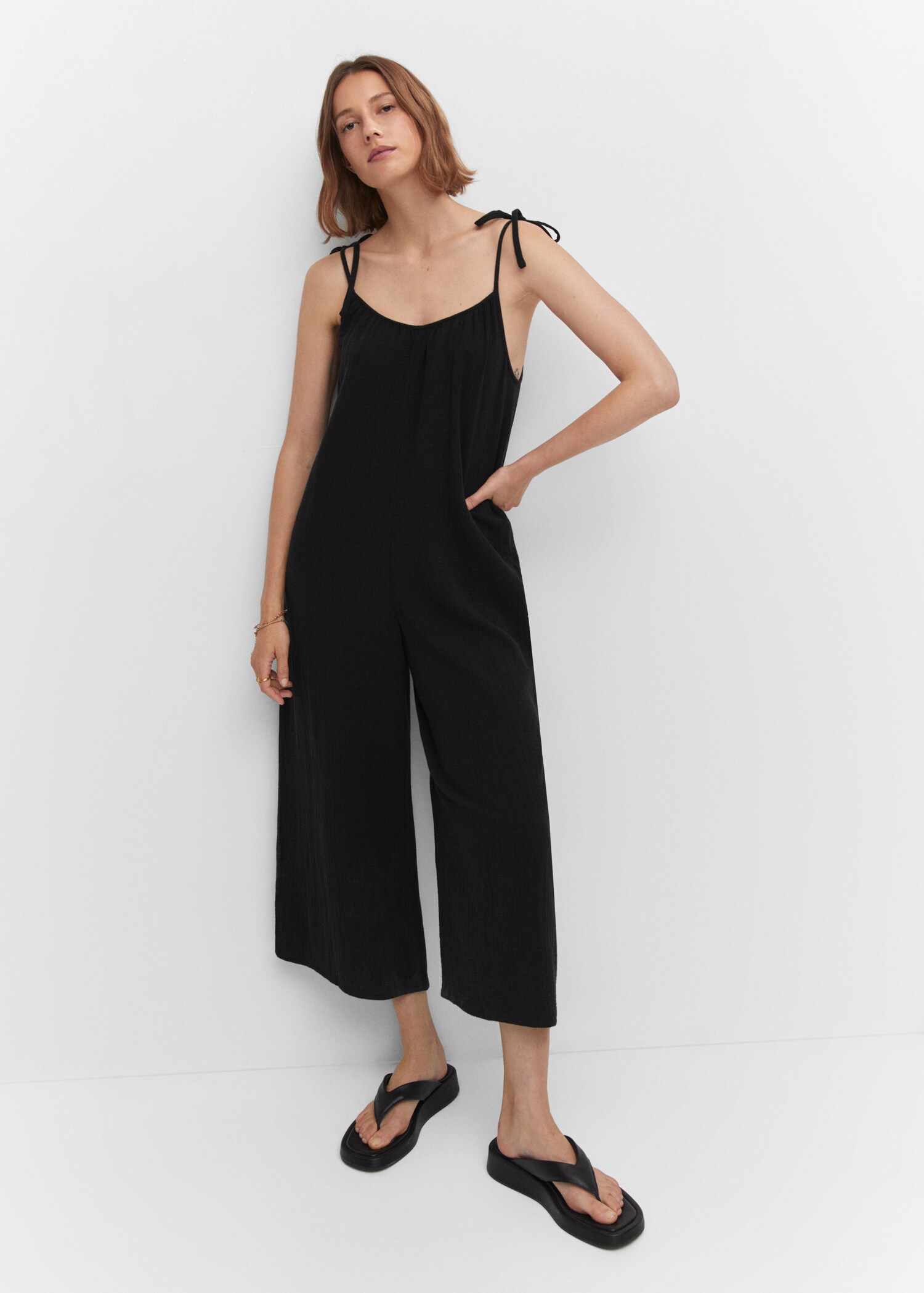 Textured jumpsuit with bows - Details of the article 2
