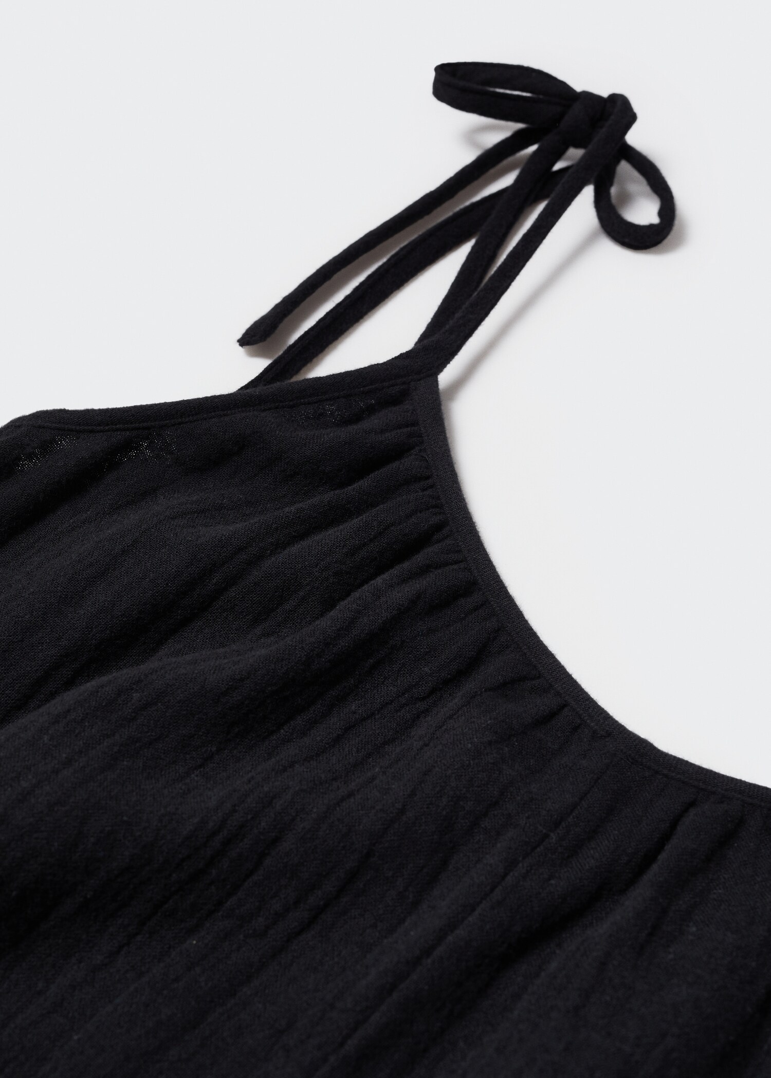 Textured jumpsuit with bows - Details of the article 8
