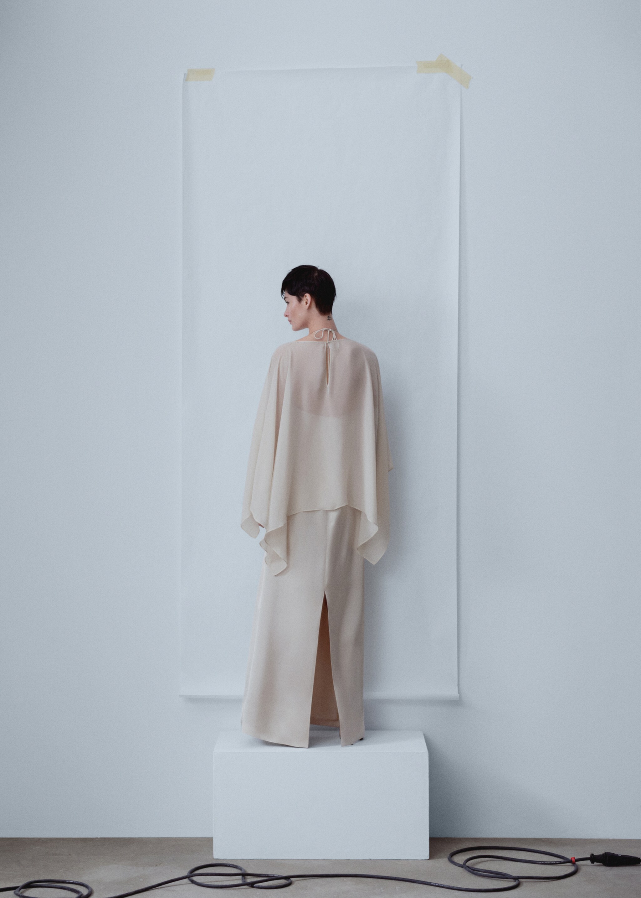 Asymmetric semi-transparent cape - Reverse of the article, Beige. Ref: 57053276-00.