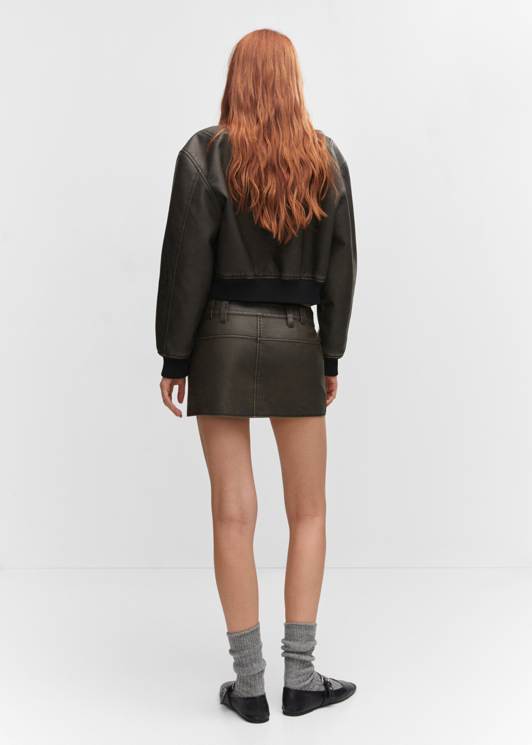 Rok met versleten leerlook - Achterkant van het artikel