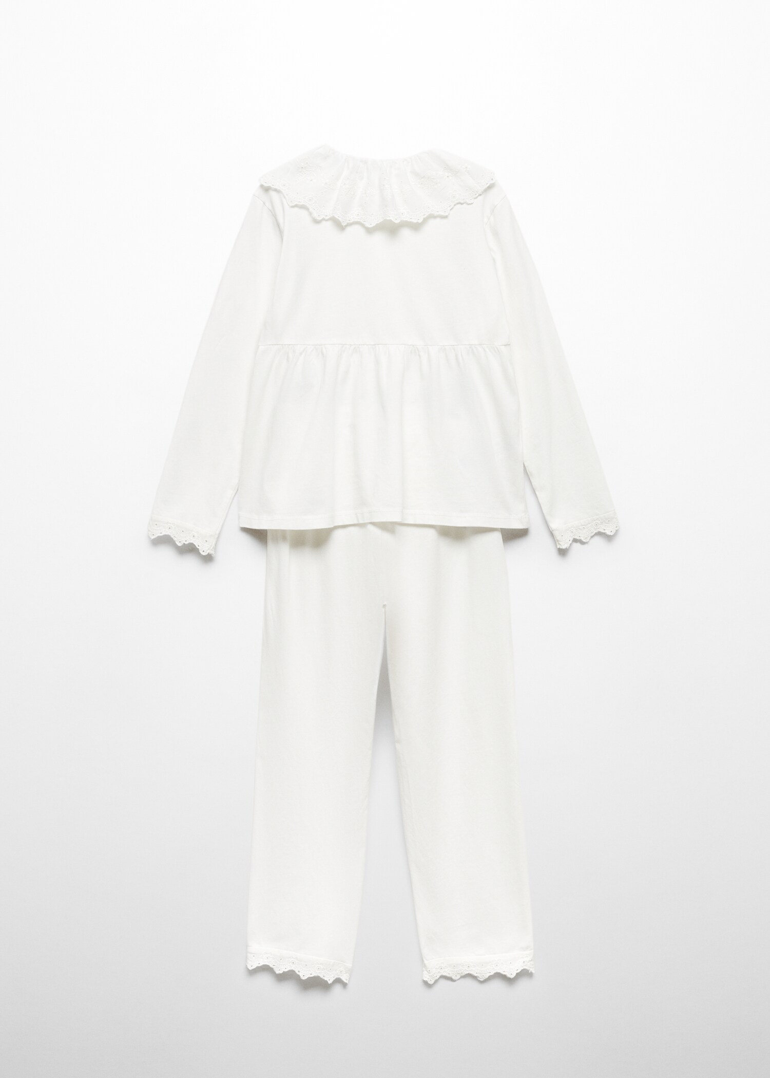 Pyjamas med broderte detaljer - Baksiden av artikkelen