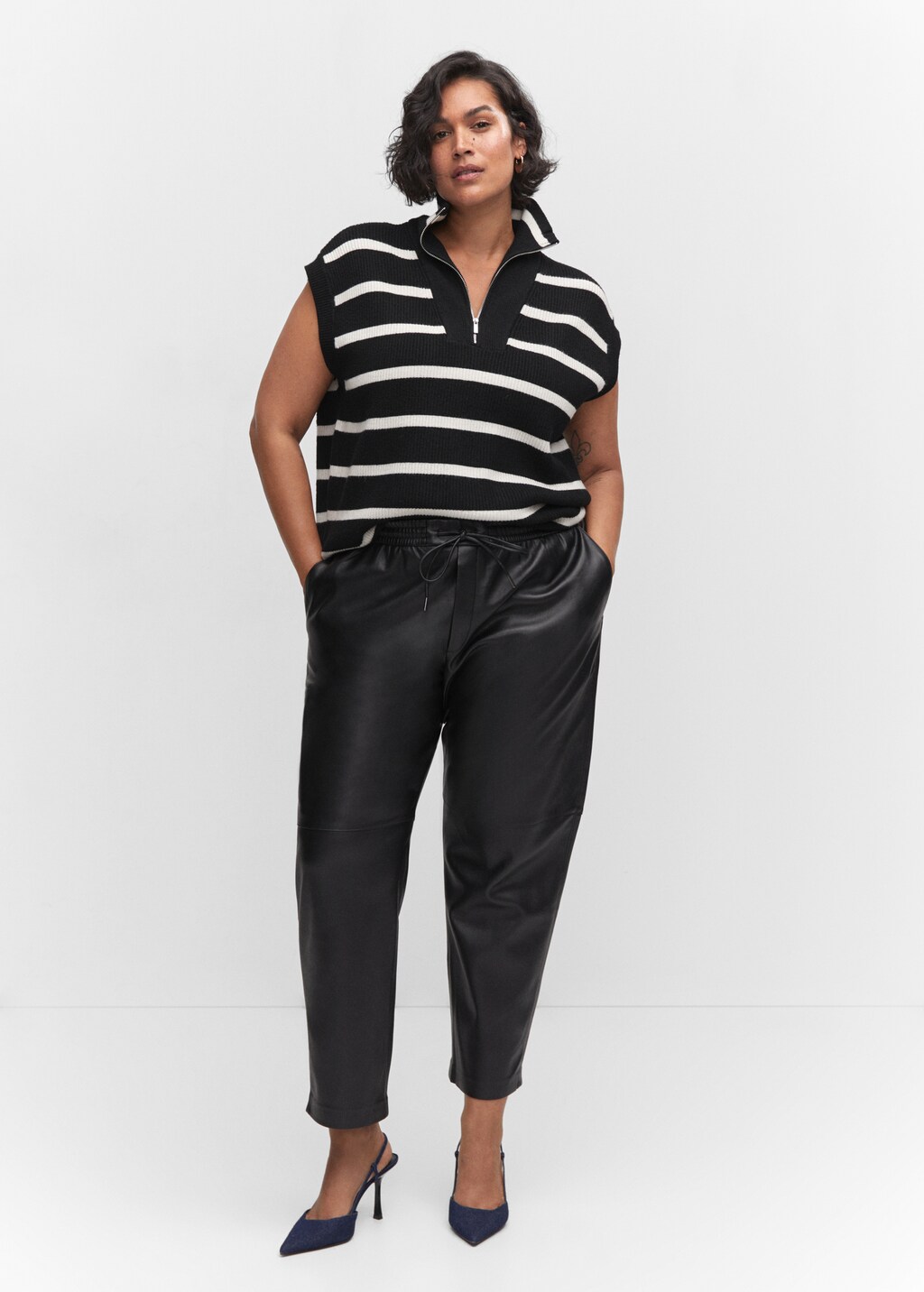 Leather-effect elastic waist trousers - Women | MANGO OUTLET USA Leather-effect elastic waist trousers - Women | MANGO OUTLET USA