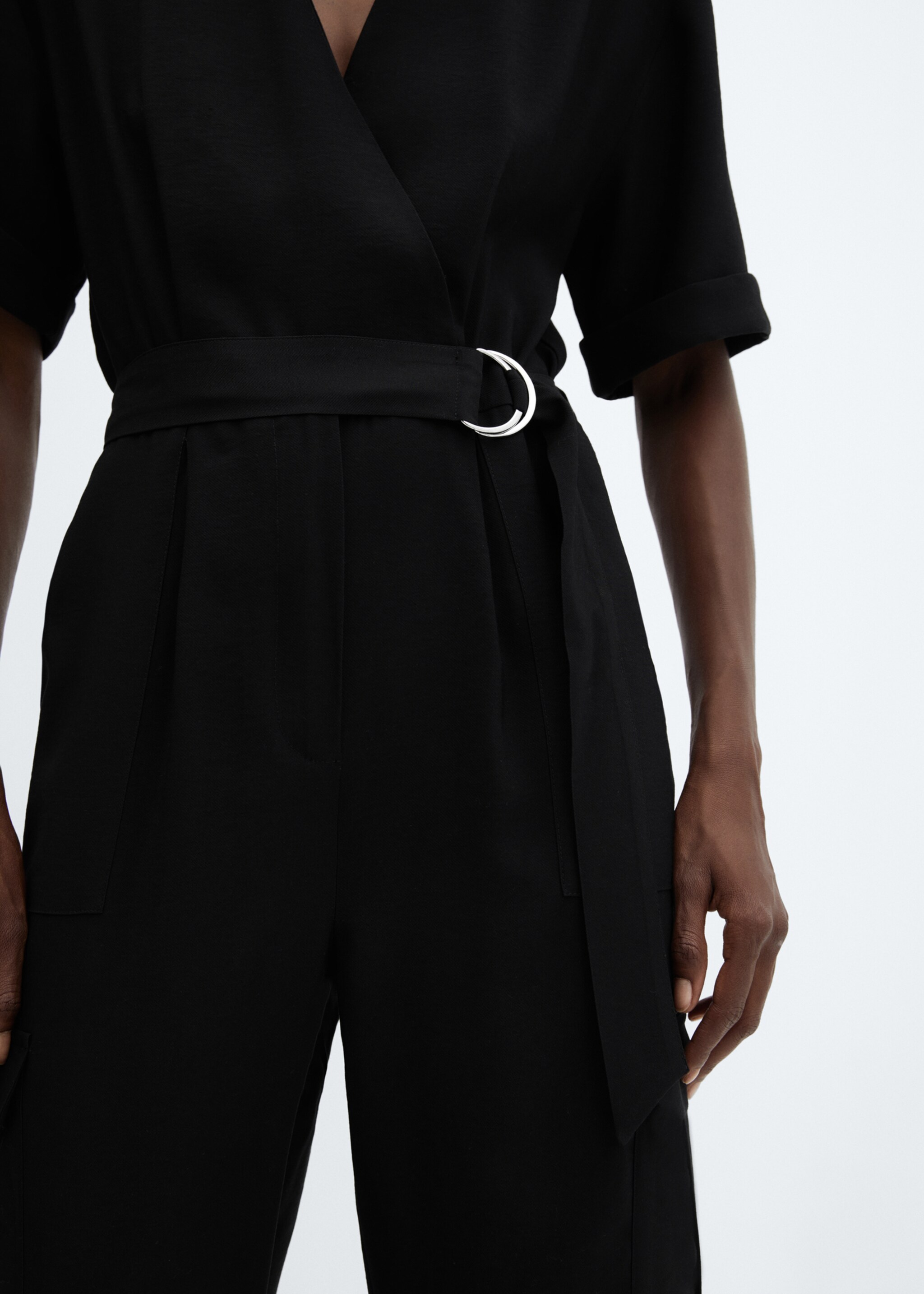 Cargo jumpsuit with pockets - Details of the article 6, Black. Ref: 57056027-00.