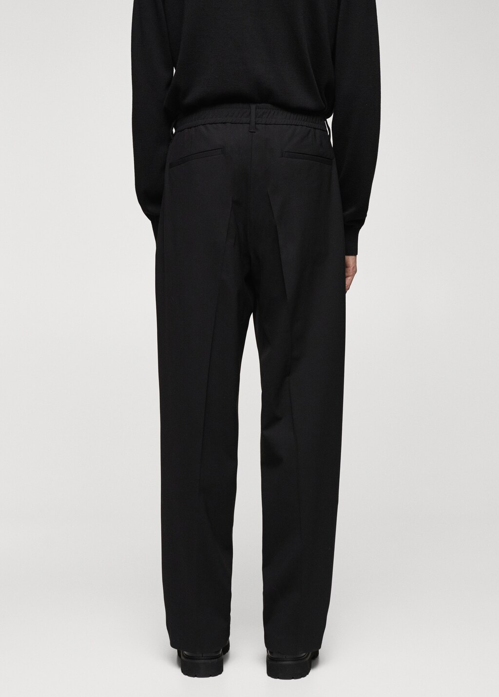 Relaxed-fit wool trousers - Men | MANGO OUTLET USA