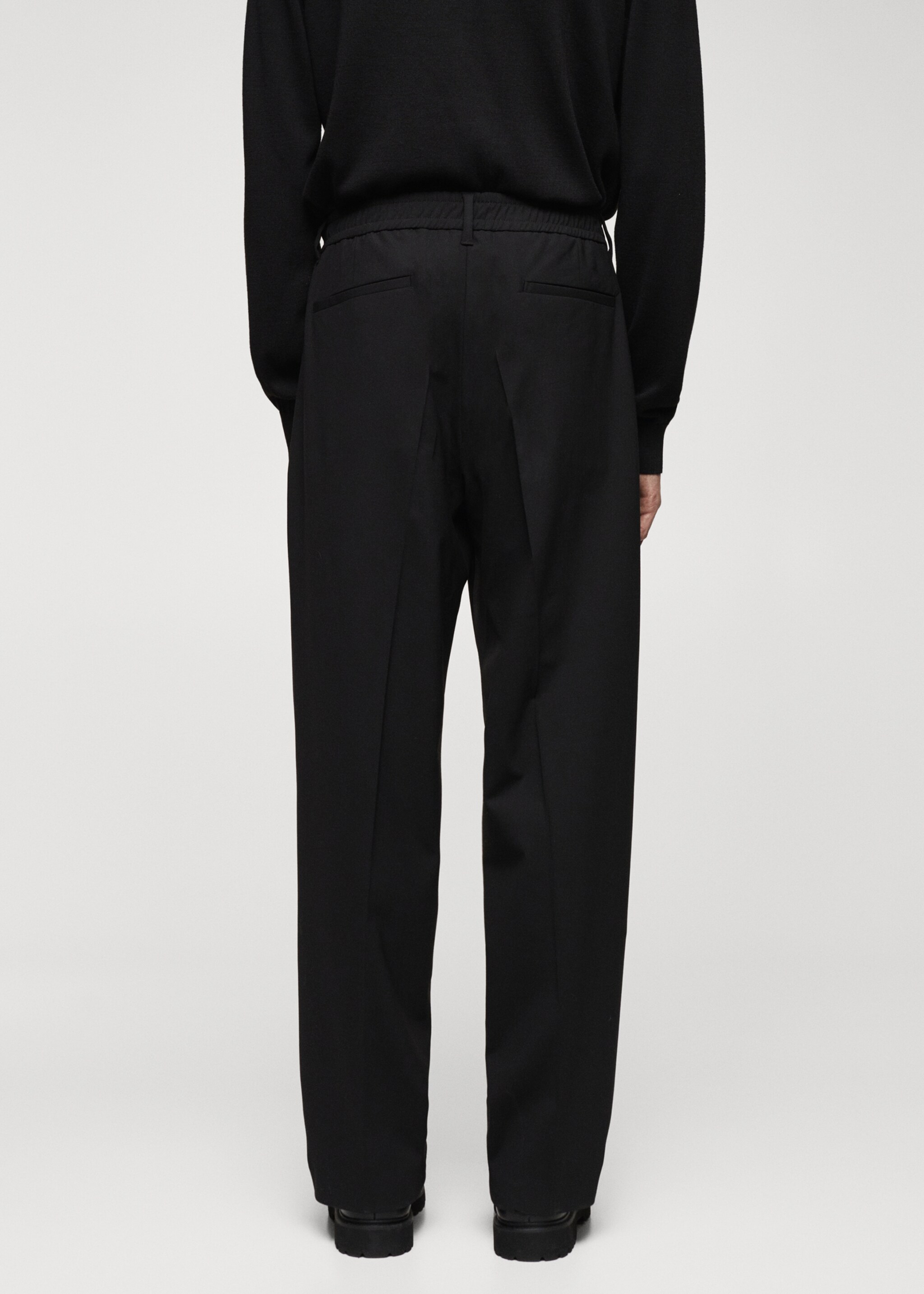 Relaxed-fit wool trousers - Reverse of the article
