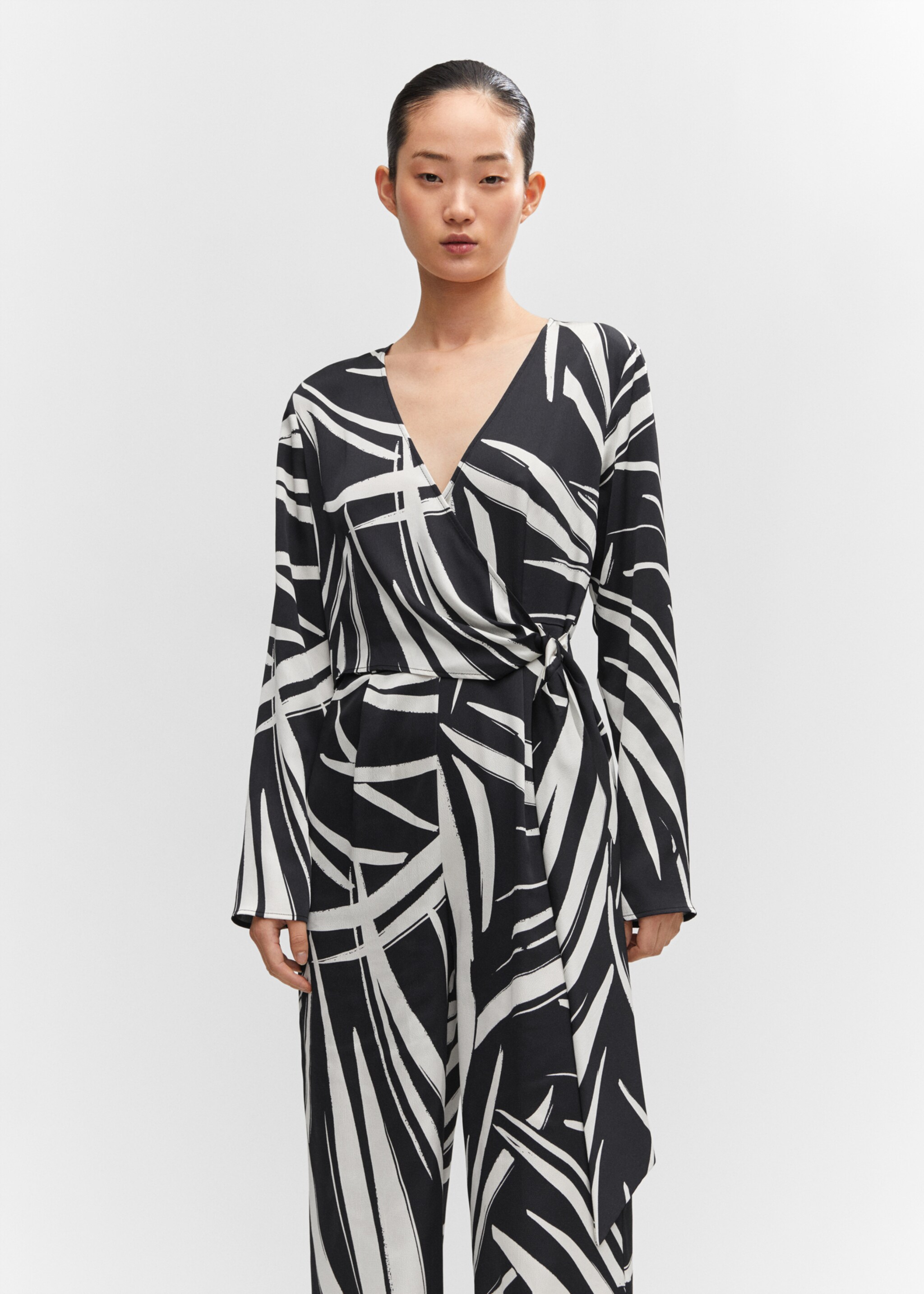 Printed wrap jumpsuit - Medium plane, Black. Ref: 57063804-00.