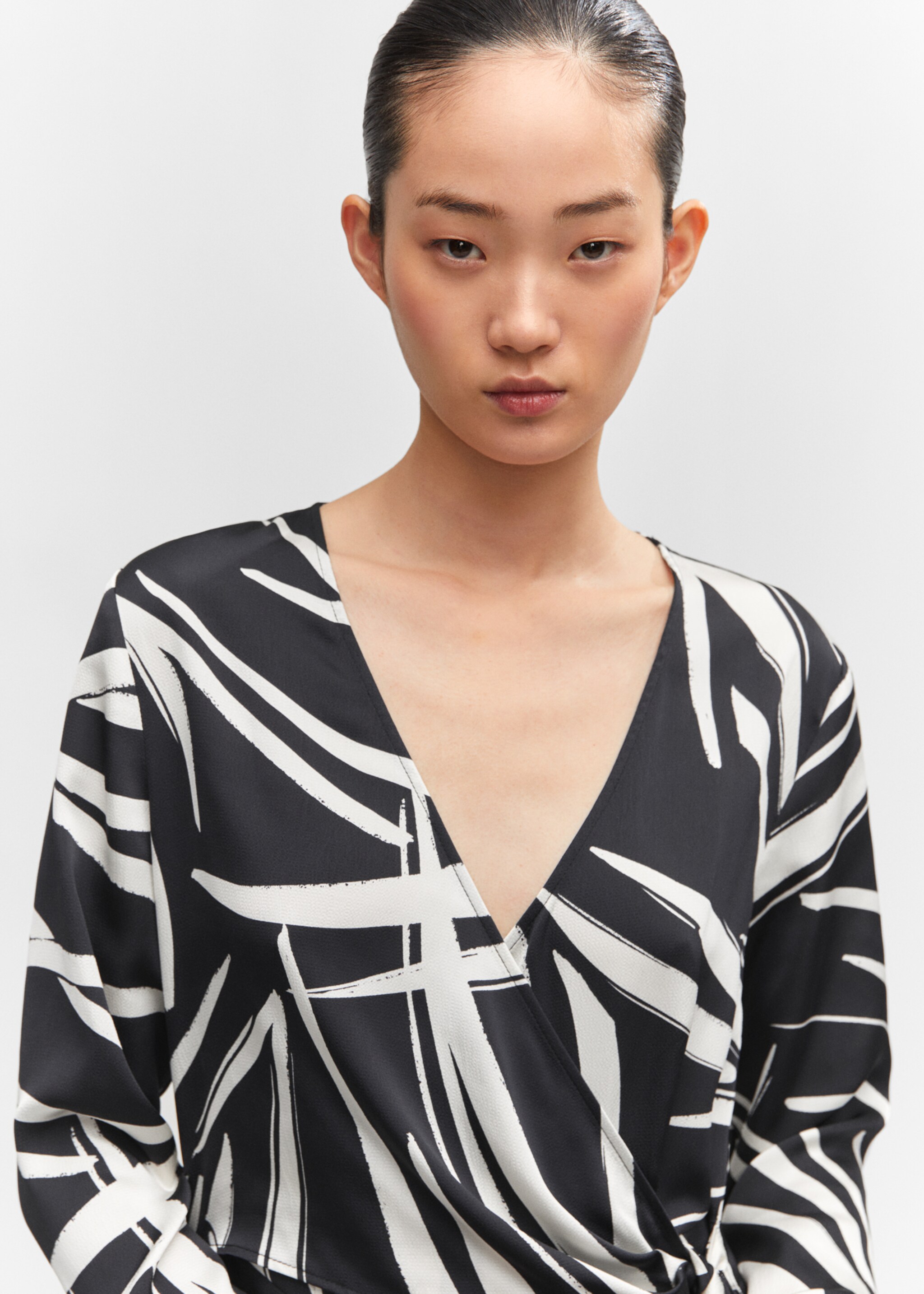 Printed wrap jumpsuit - Details of the article 1, Black. Ref: 57063804-00.