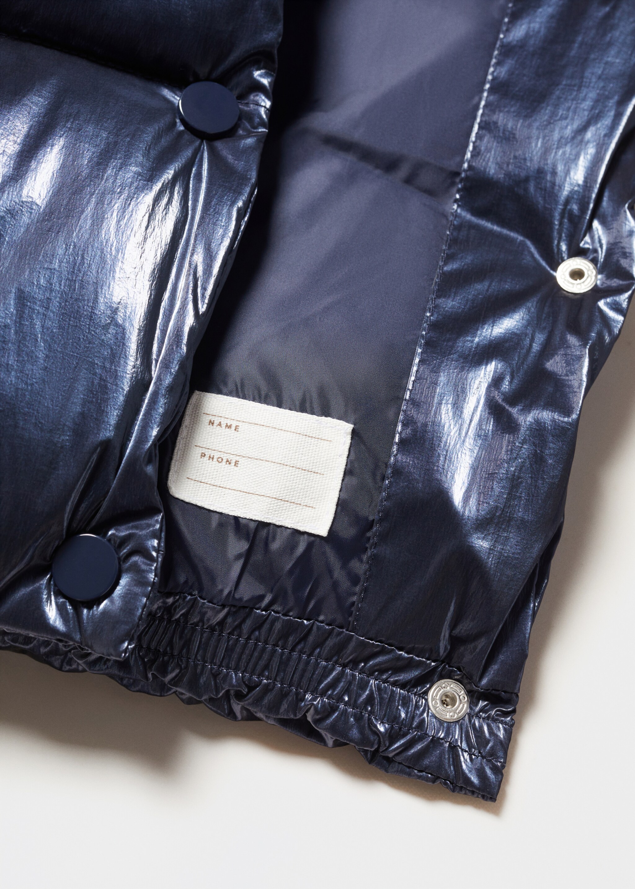 Gilet matelassé à capuche - Détail de l'article 8