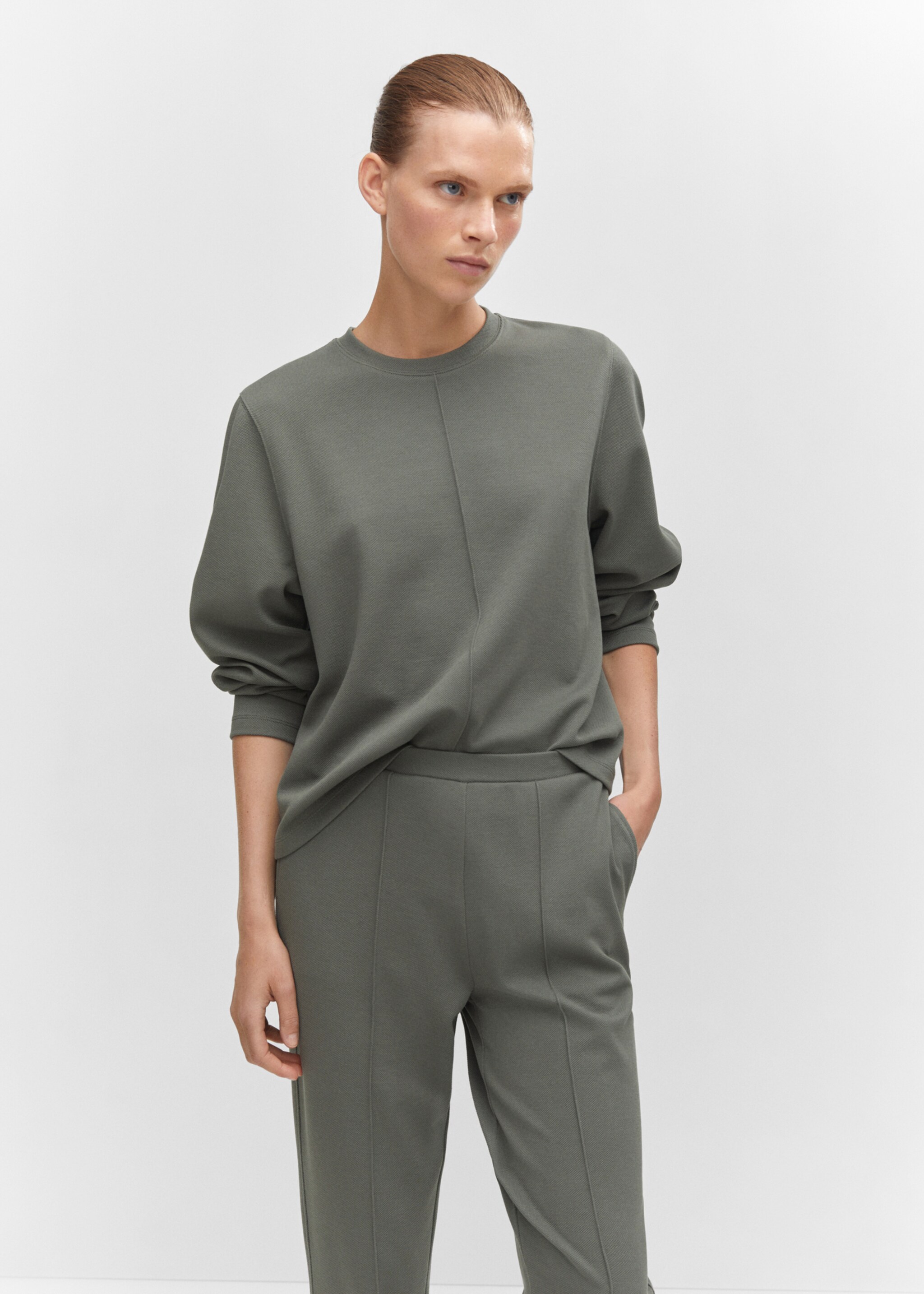 Jogger trousers with seam detail - Details of the article 1