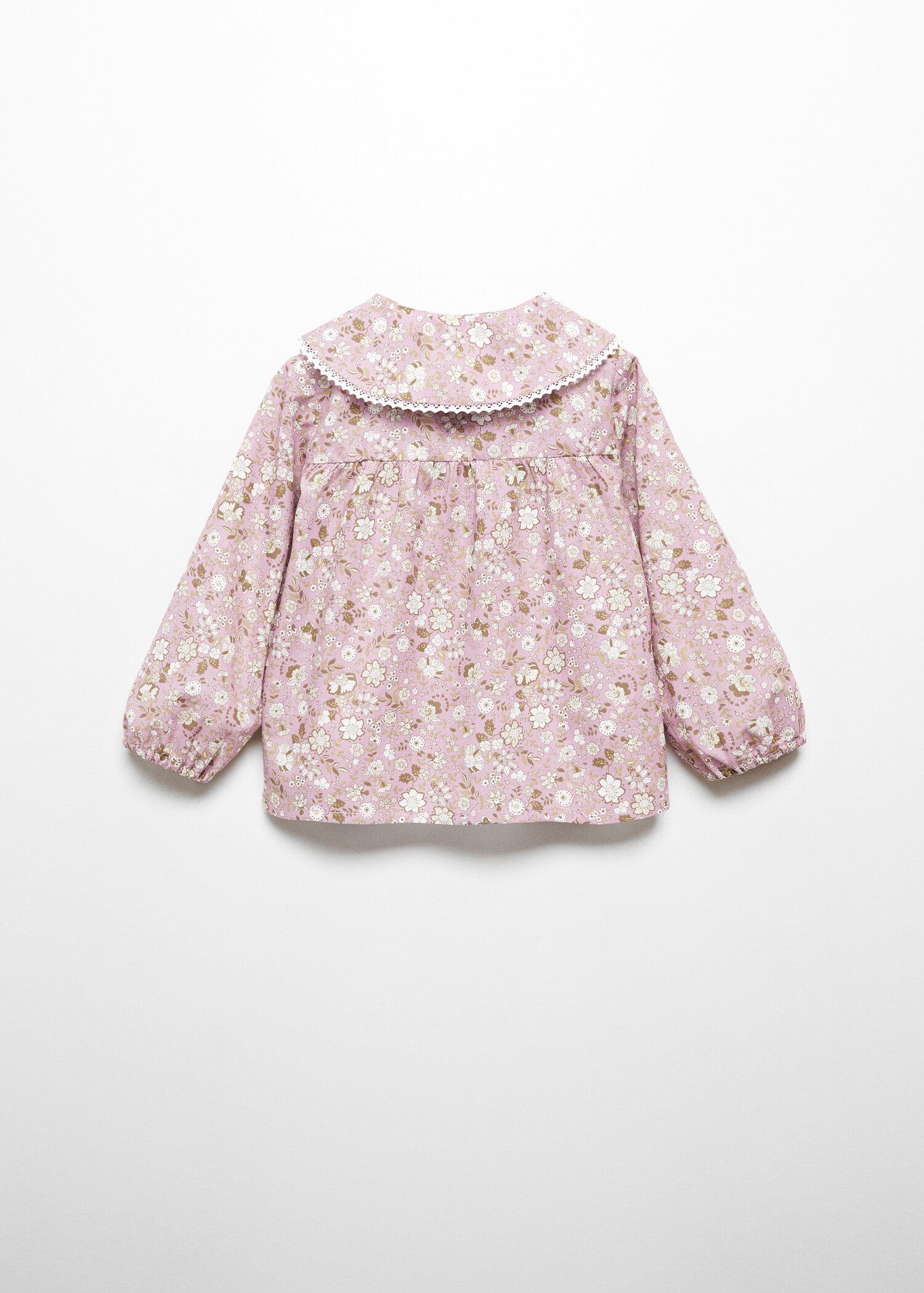 Bluse med blomstertrykk - Baksiden av artikkelen