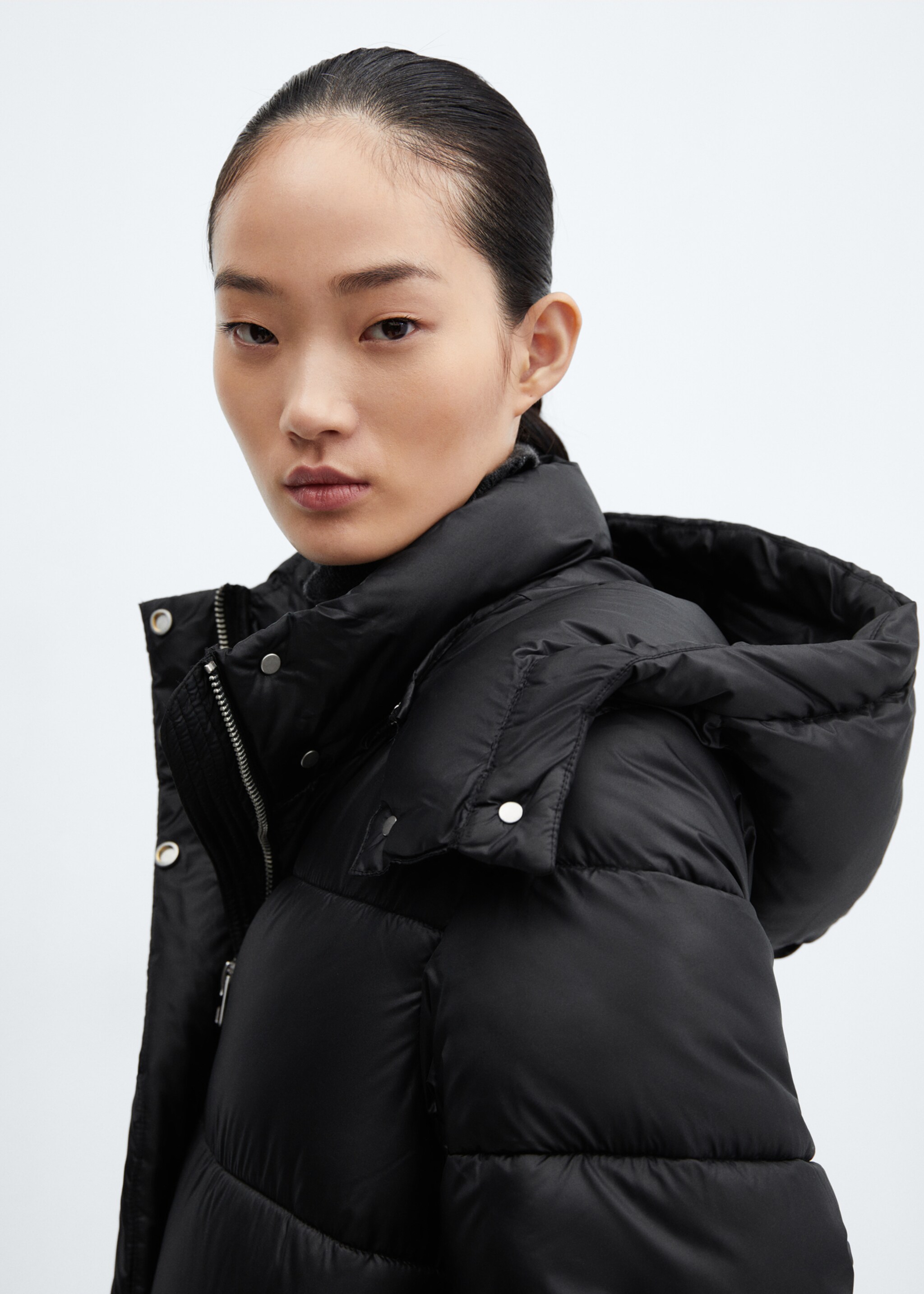 Hooded water-repellent quilted jacket - Details of the article 1, Black. Ref: 57069079-00.