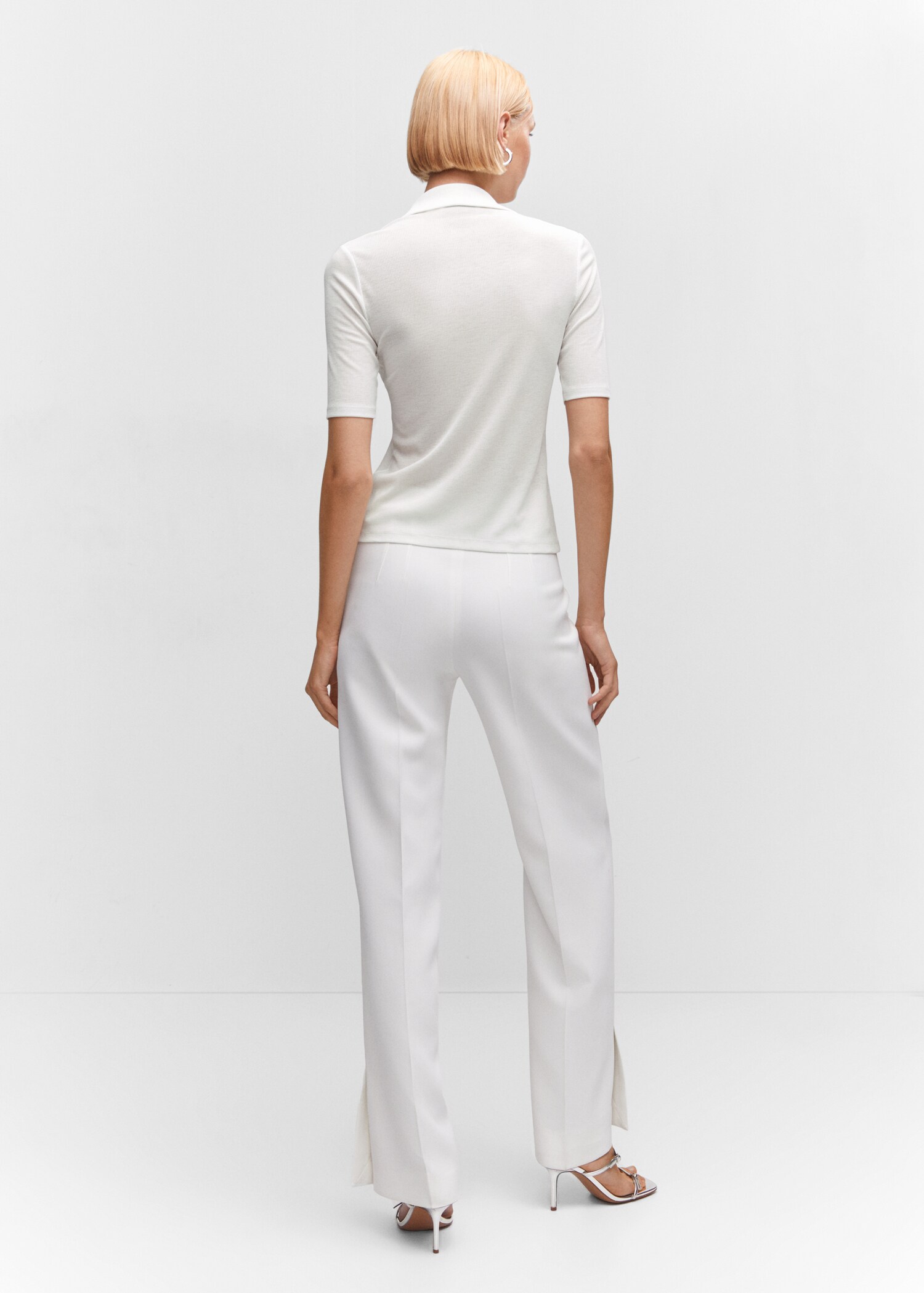 Short-sleeved polo shirt with buttons - Reverse of the article