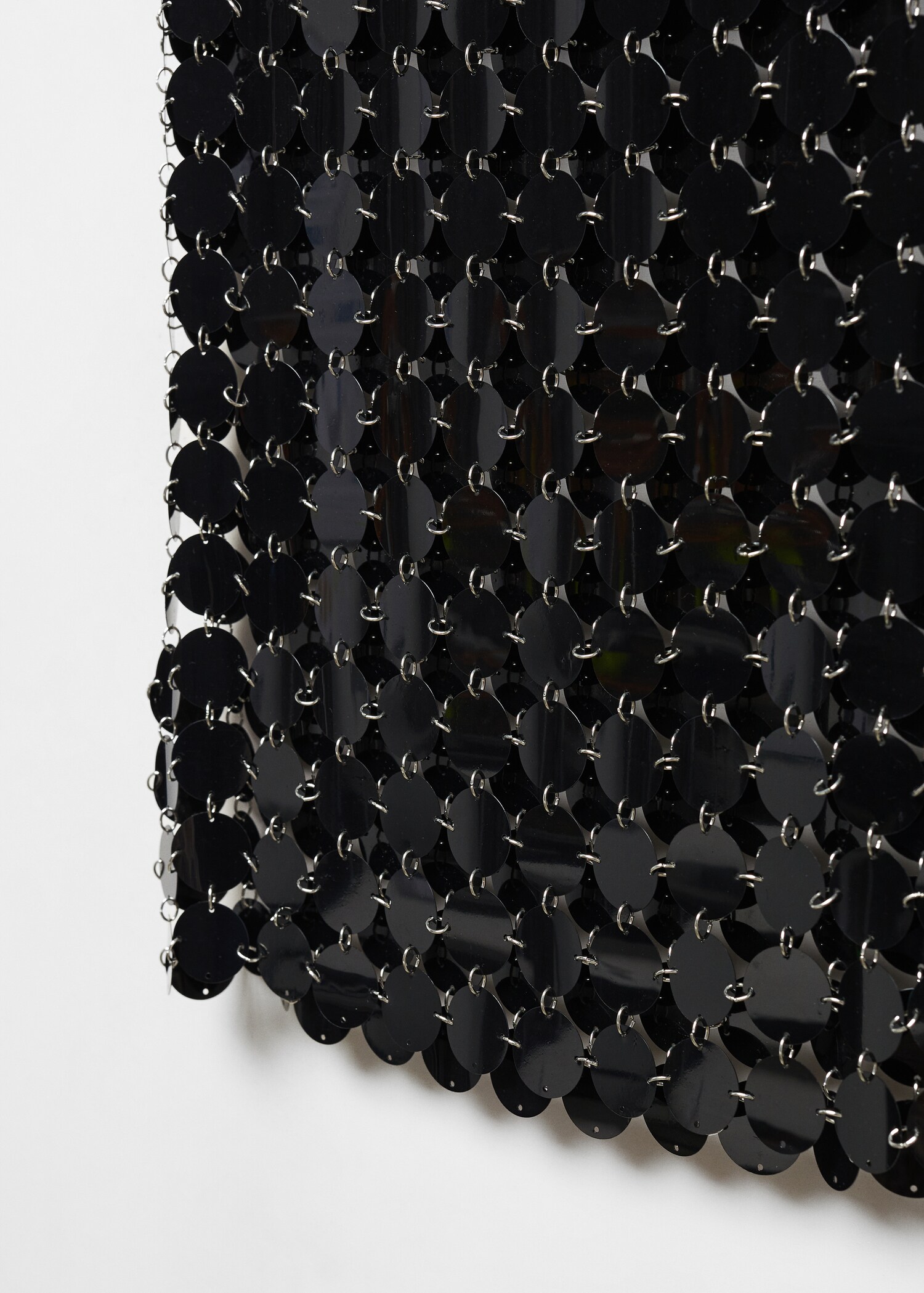 Rok met metallic schijven - Detail van het artikel 8
