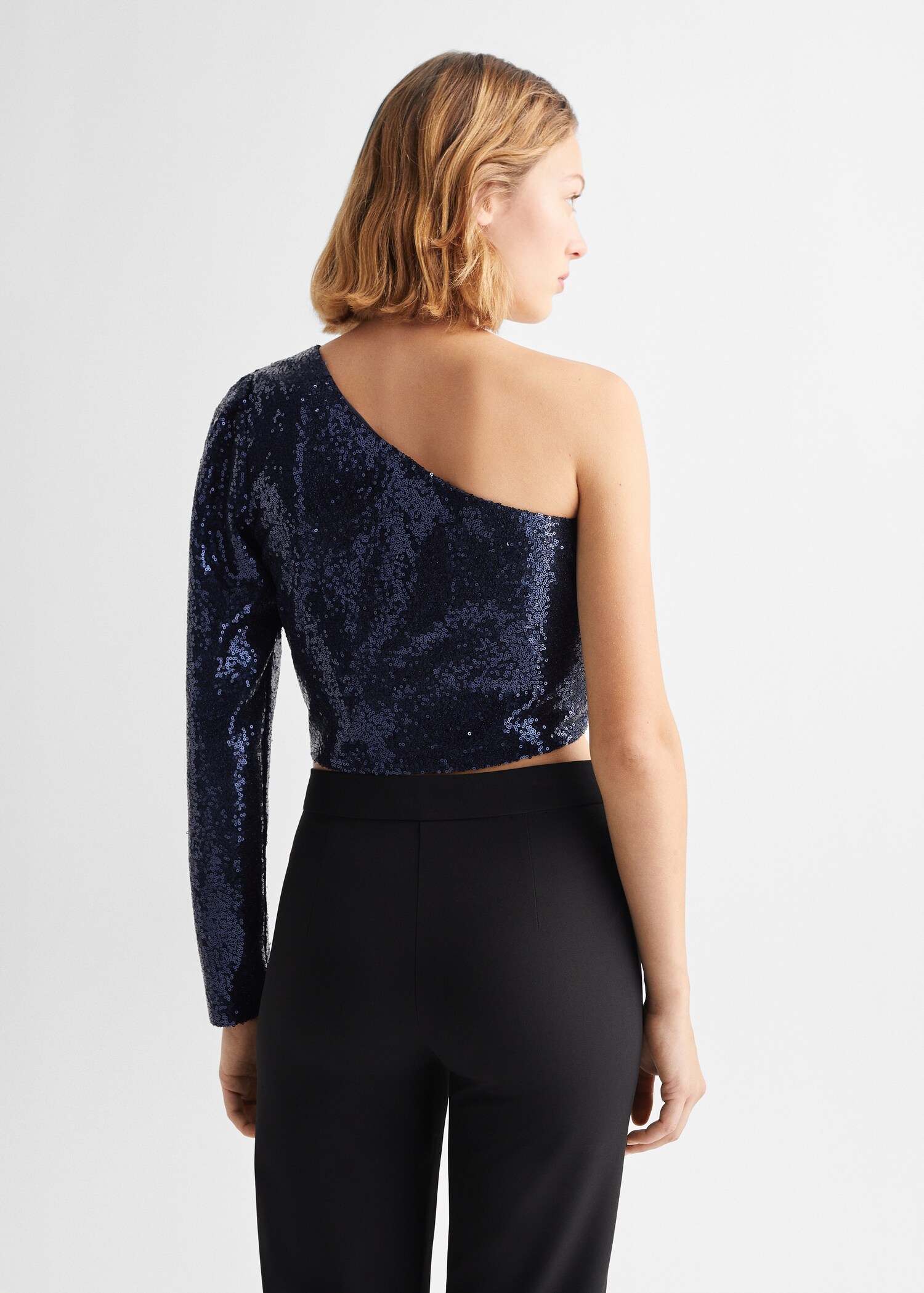 Top asymétrique sequins - Verso de l’article