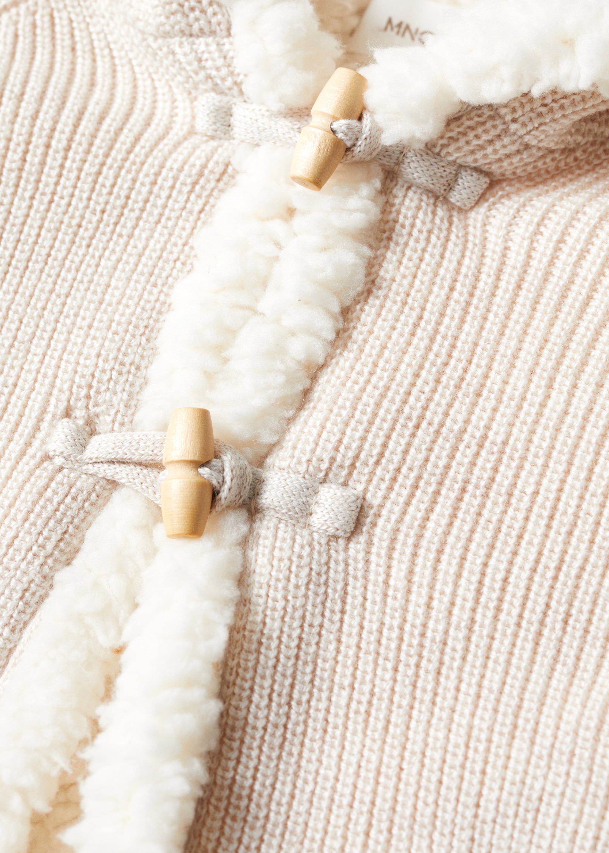 Knitted cardigan with fur-effect lining - Details of the article 0