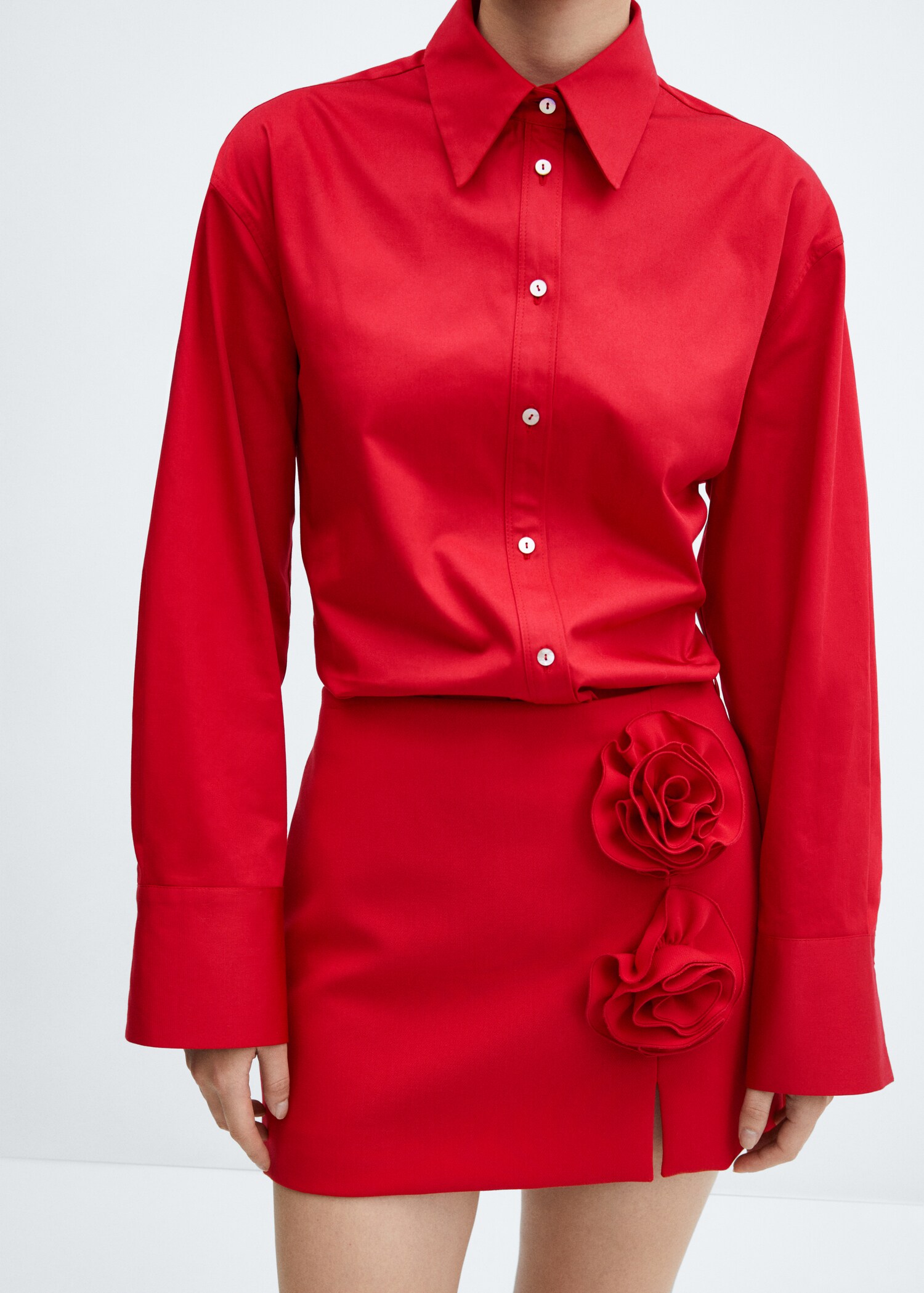 Mini-skirt with flower appliqué - Details of the article 1