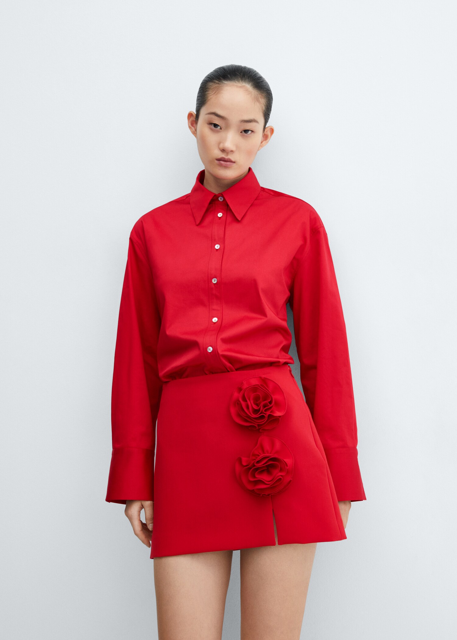 Mini-skirt with flower appliqué - Details of the article 2
