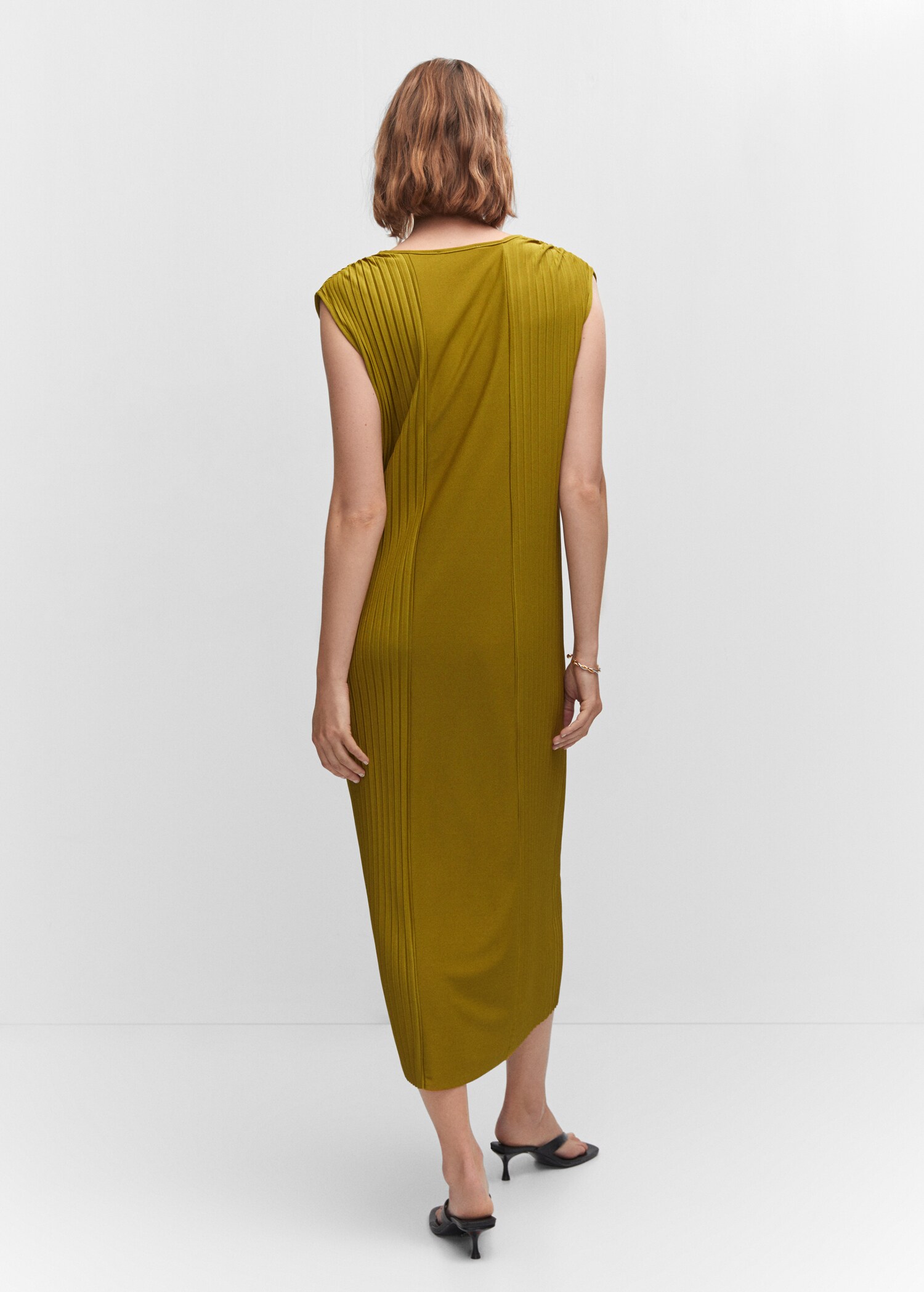 Vestit detalls prisats - Revers de l'article