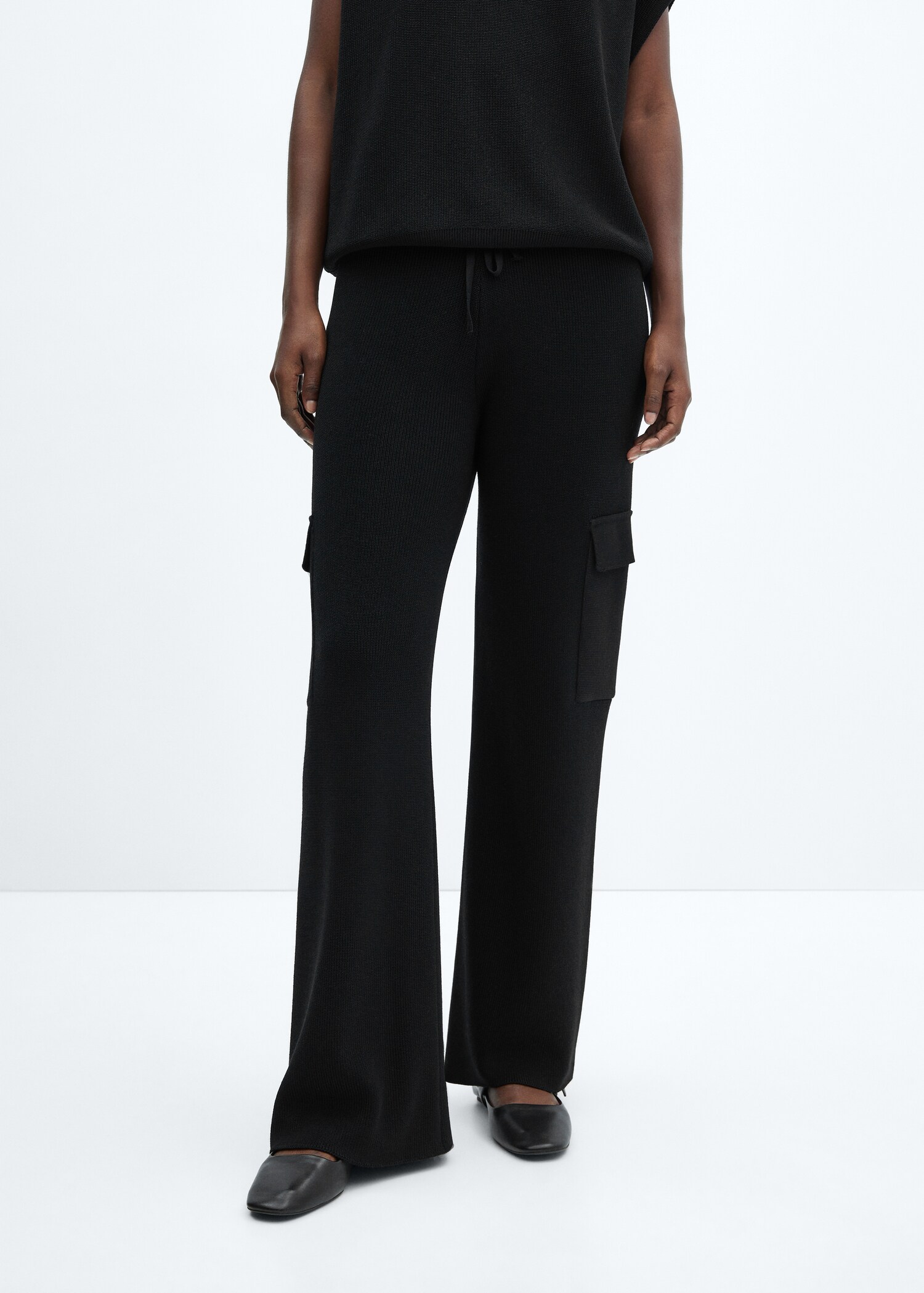 Knitted trousers with cargo pockets - Medium plane