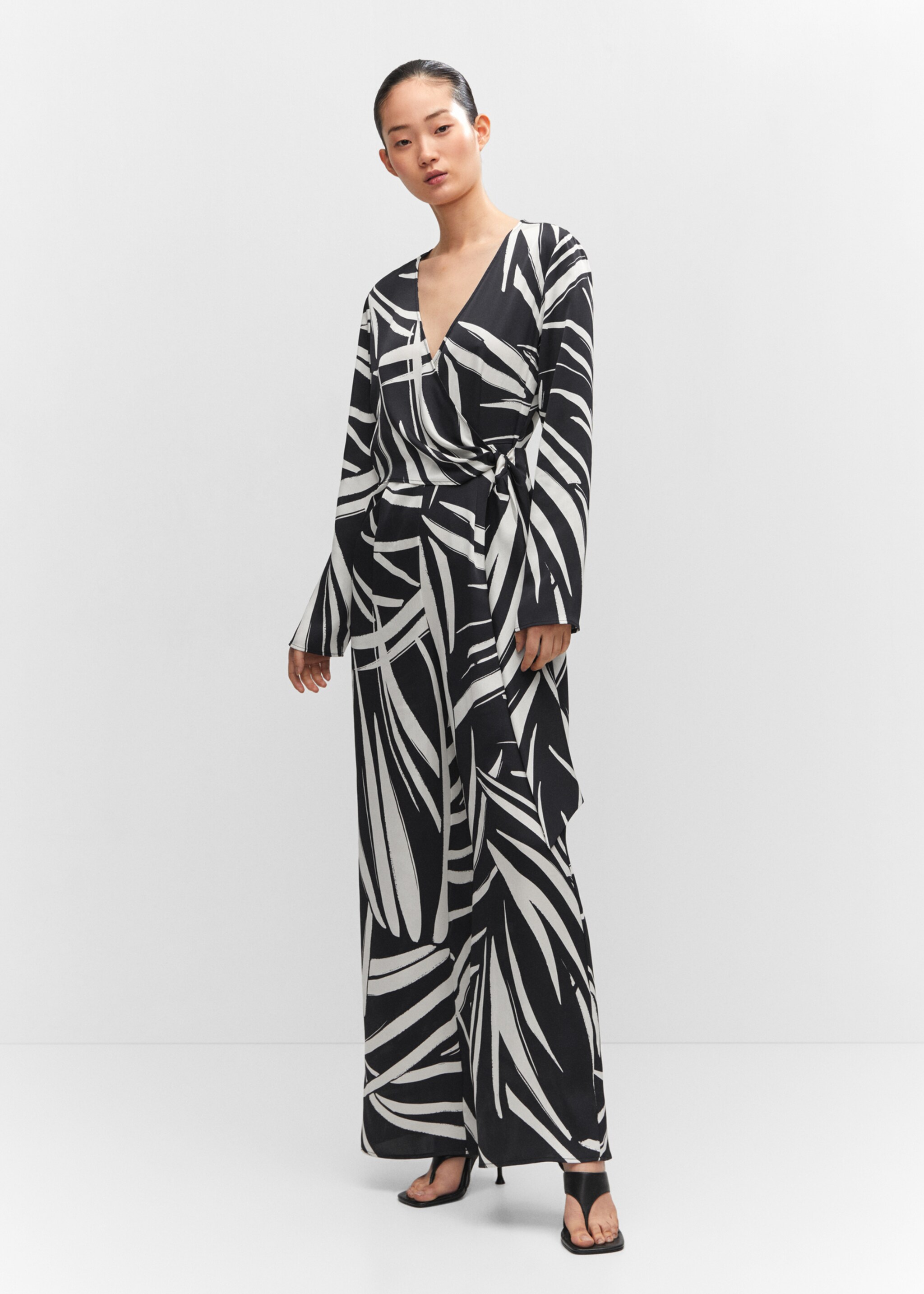 Printed wrap jumpsuit - General plane, Black. Ref: 57063804-00.