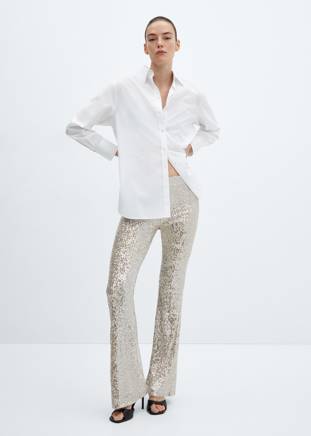 Sequin flared trousers - Women | MANGO OUTLET USA Sequin flared trousers - Women | MANGO OUTLET USA
