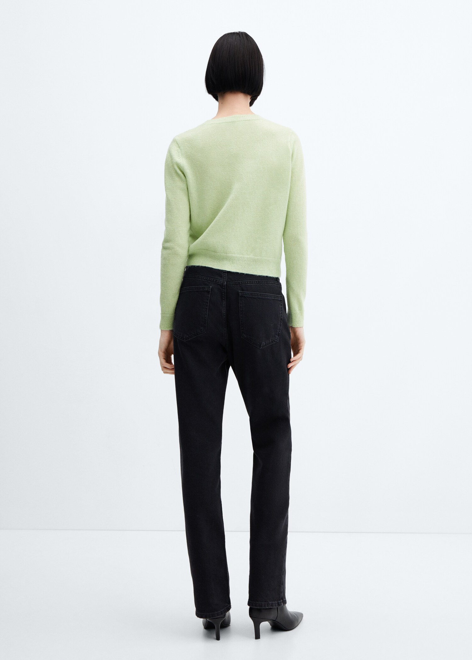 Round-neck knitted sweater - Reverse of the article