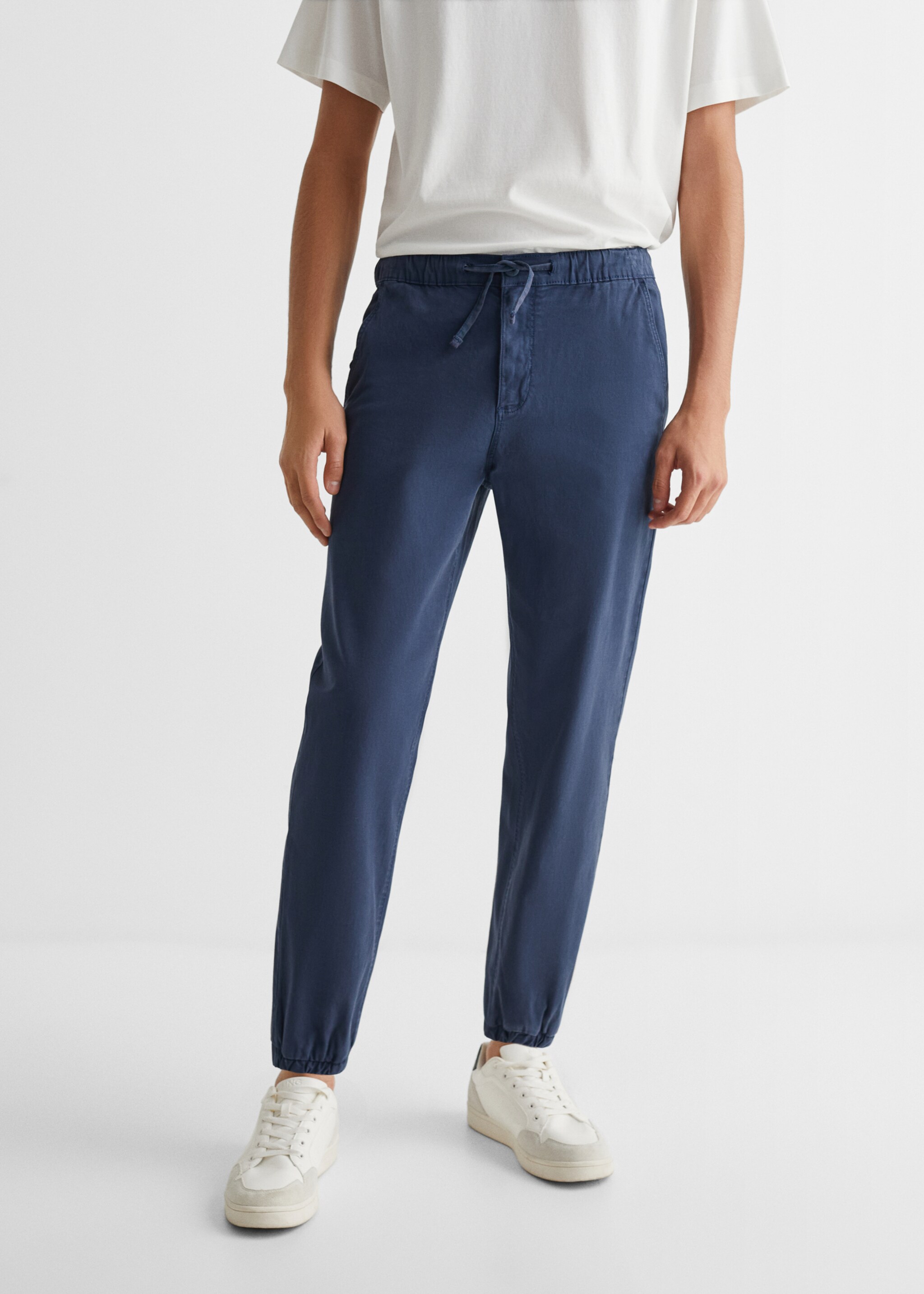Cotton jogger-style trousers - Details of the article 6, Navy. Ref: 67000666-00.