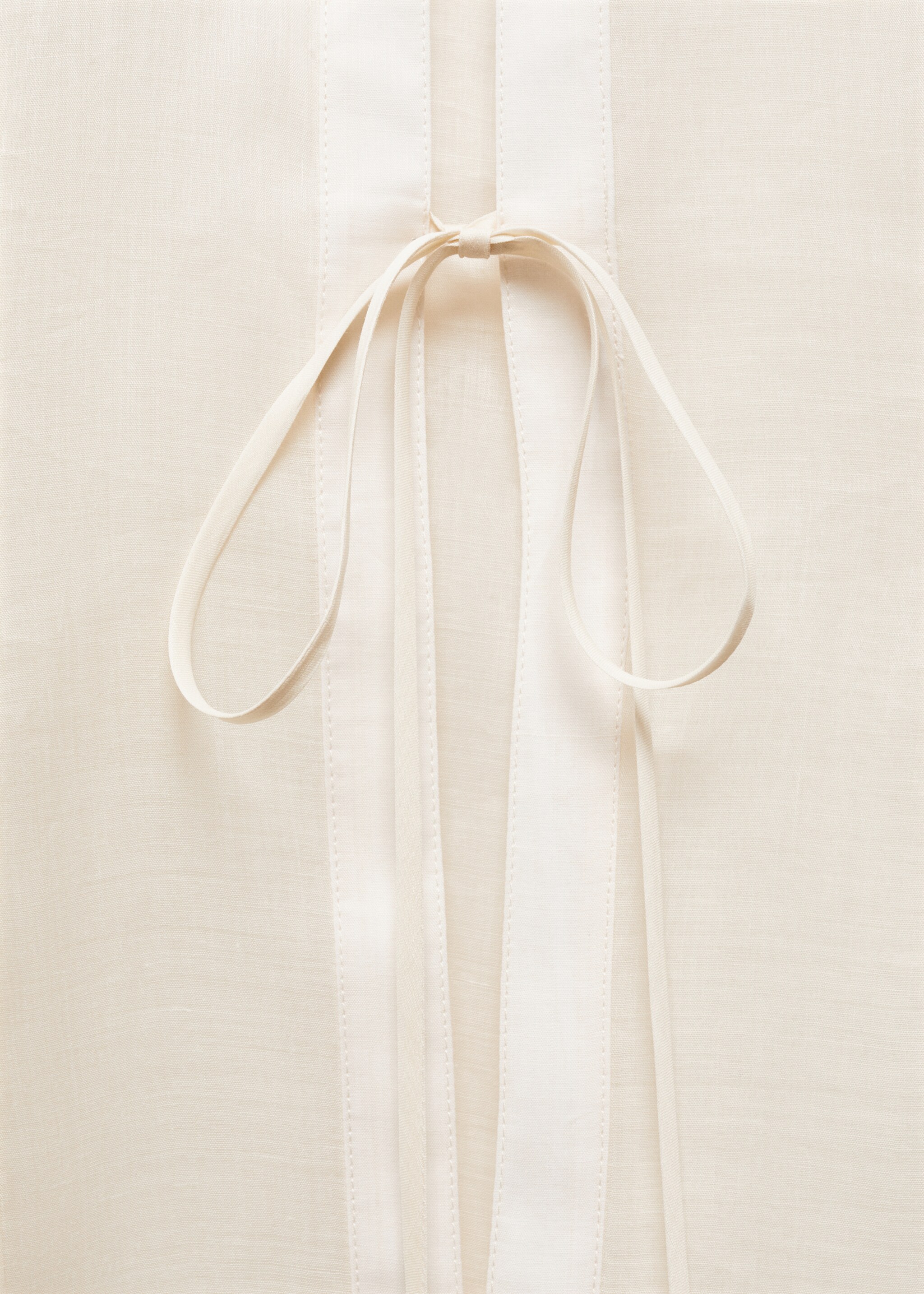 Ramie shirt with bow closure - Details of the article 8, Ecru. Ref: 67007135-00.