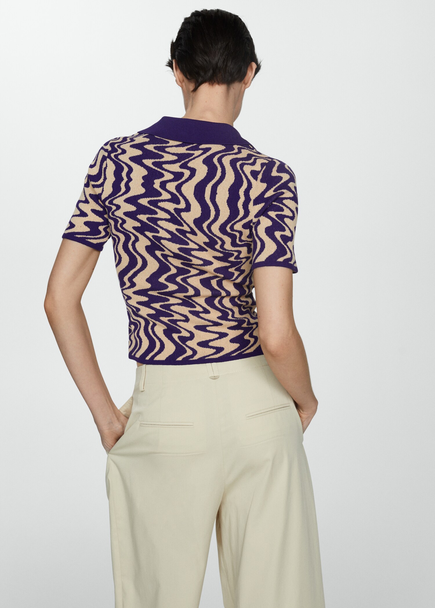 Knitted polo-neck sweater - Reverse of the article