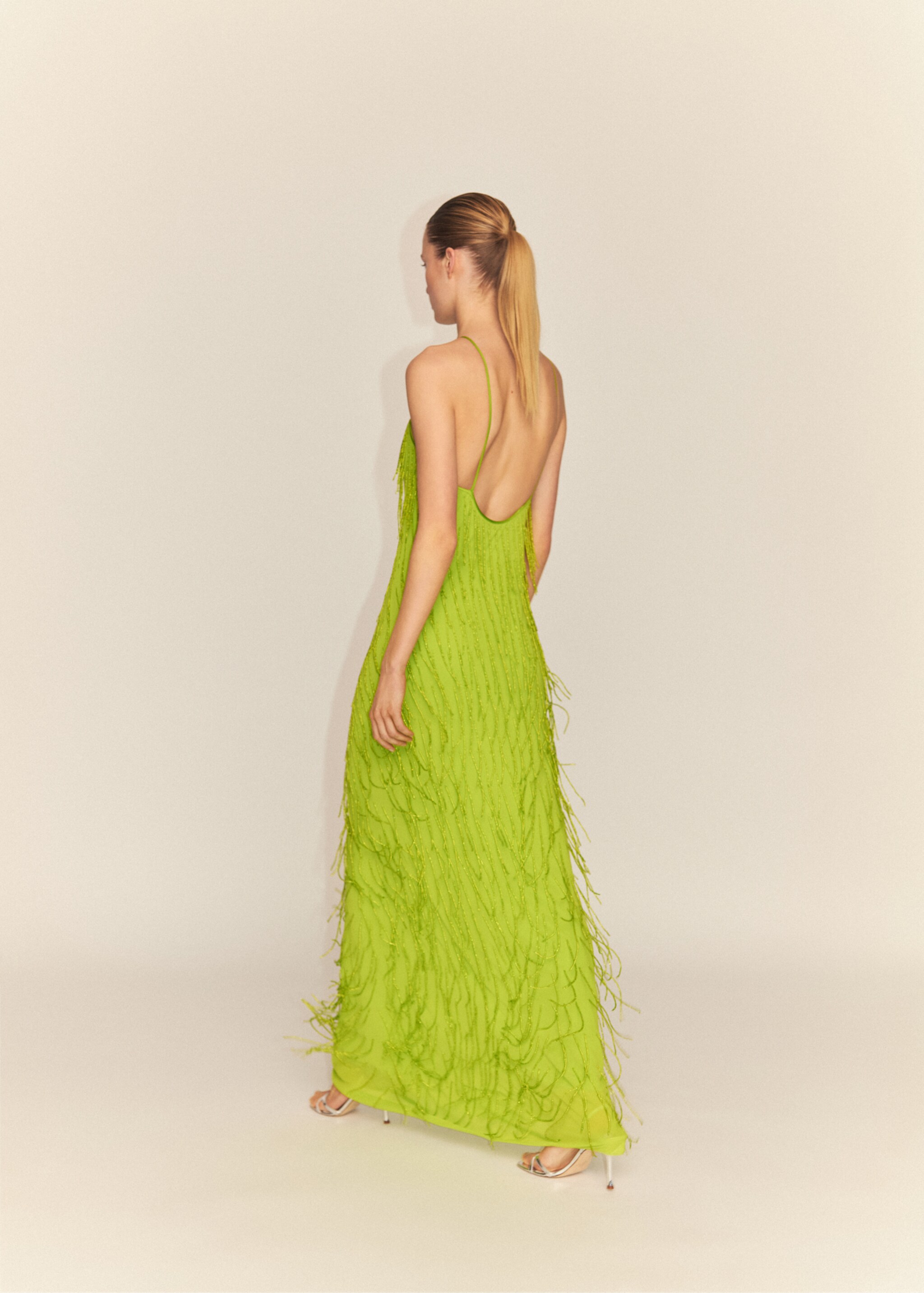 Halter dress with rhinestone fringes - Reverse of the article