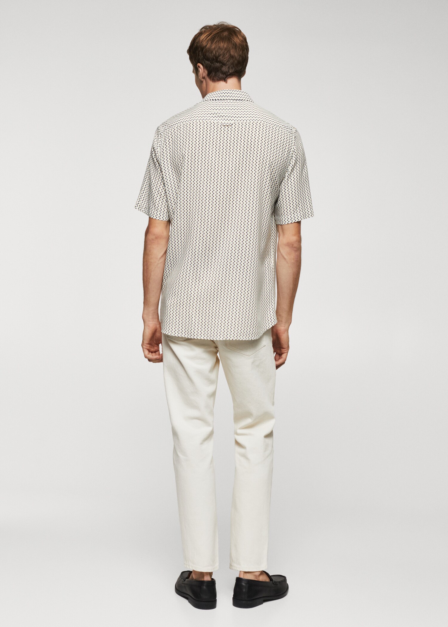 Short-sleeve polka-dot shirt - Reverse of the article