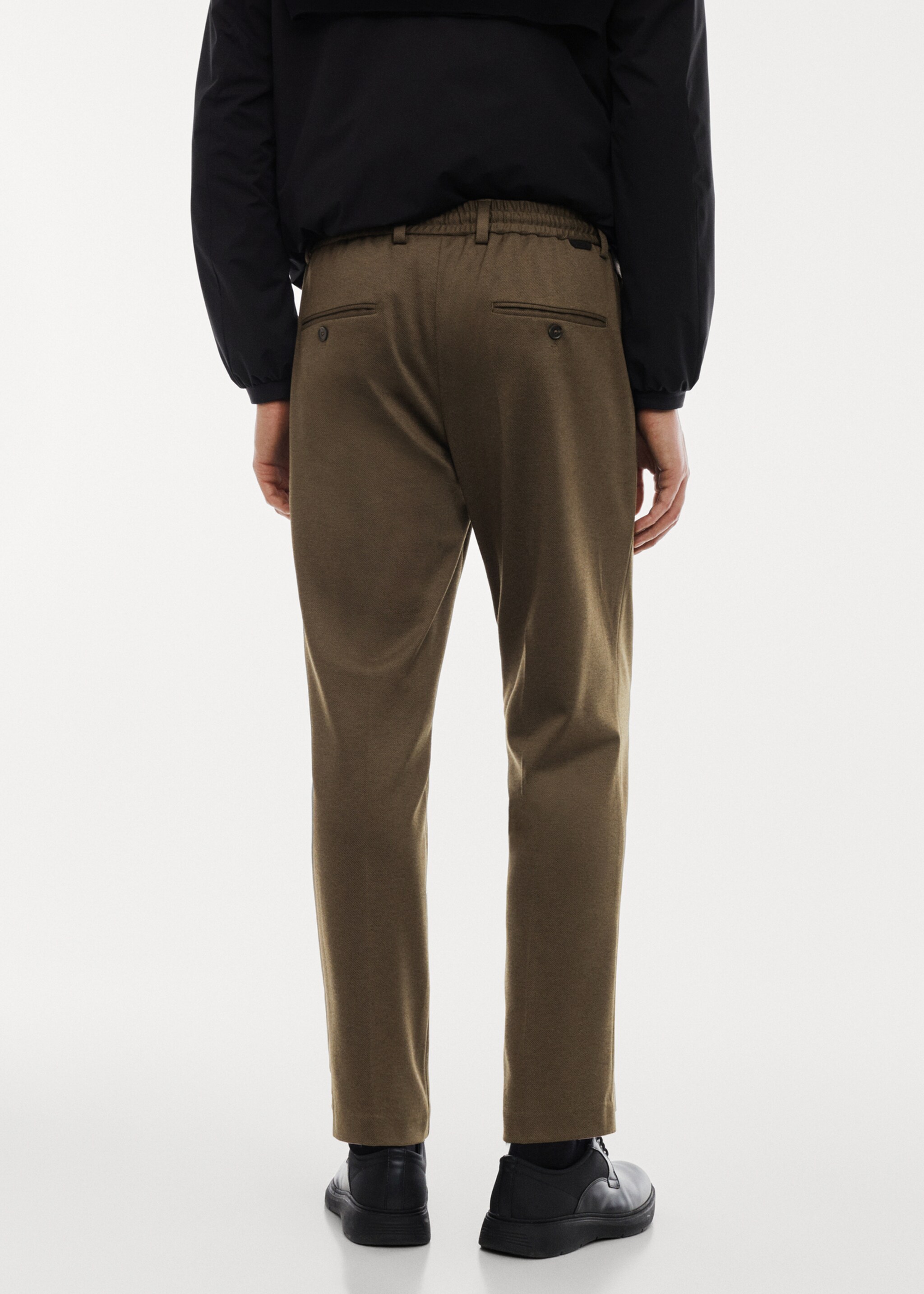 Crease-resistant slim-fit trousers - Reverse of the article