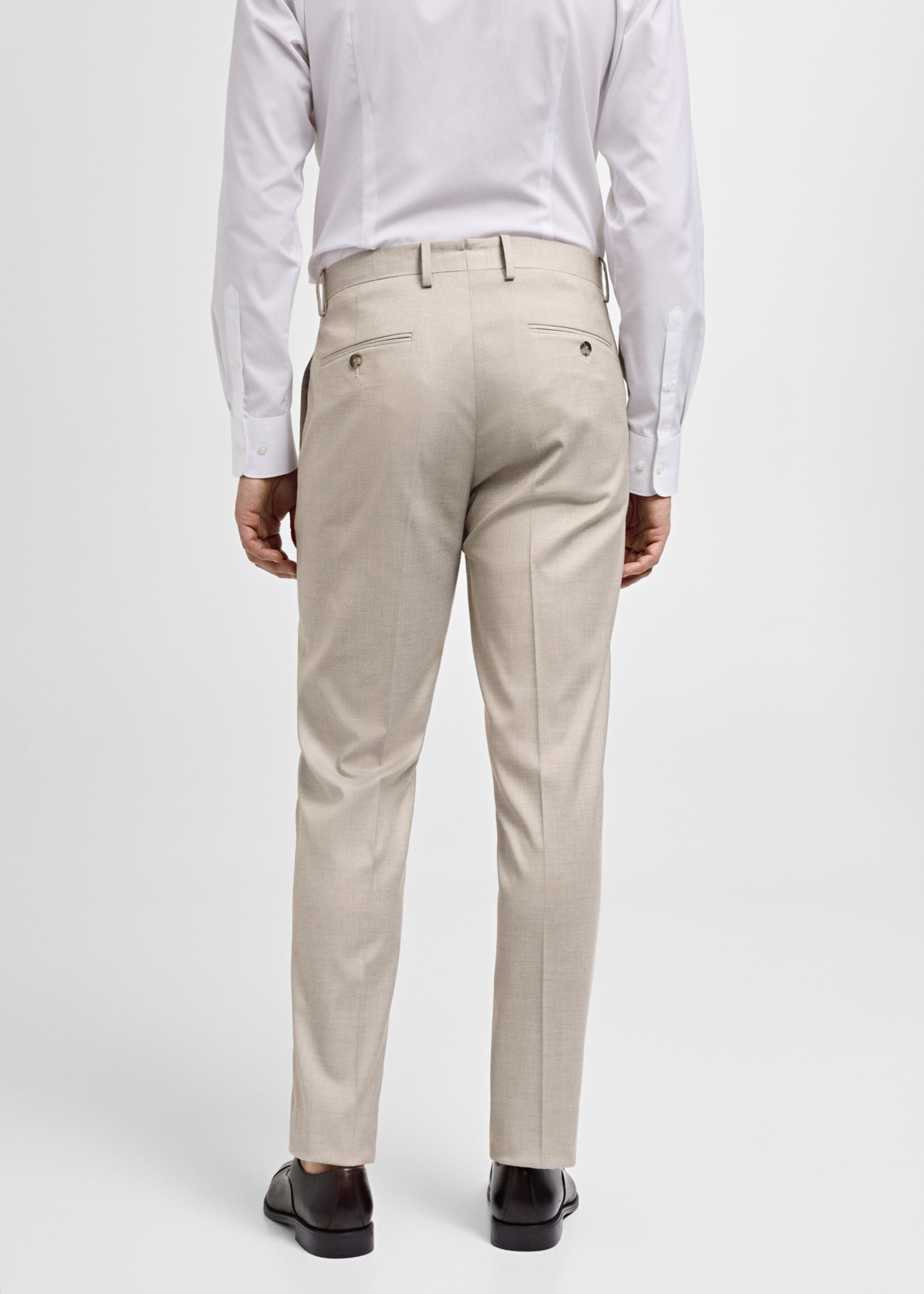 Calças de fato slim fit de tecido comfort stretch - Verso do artigo