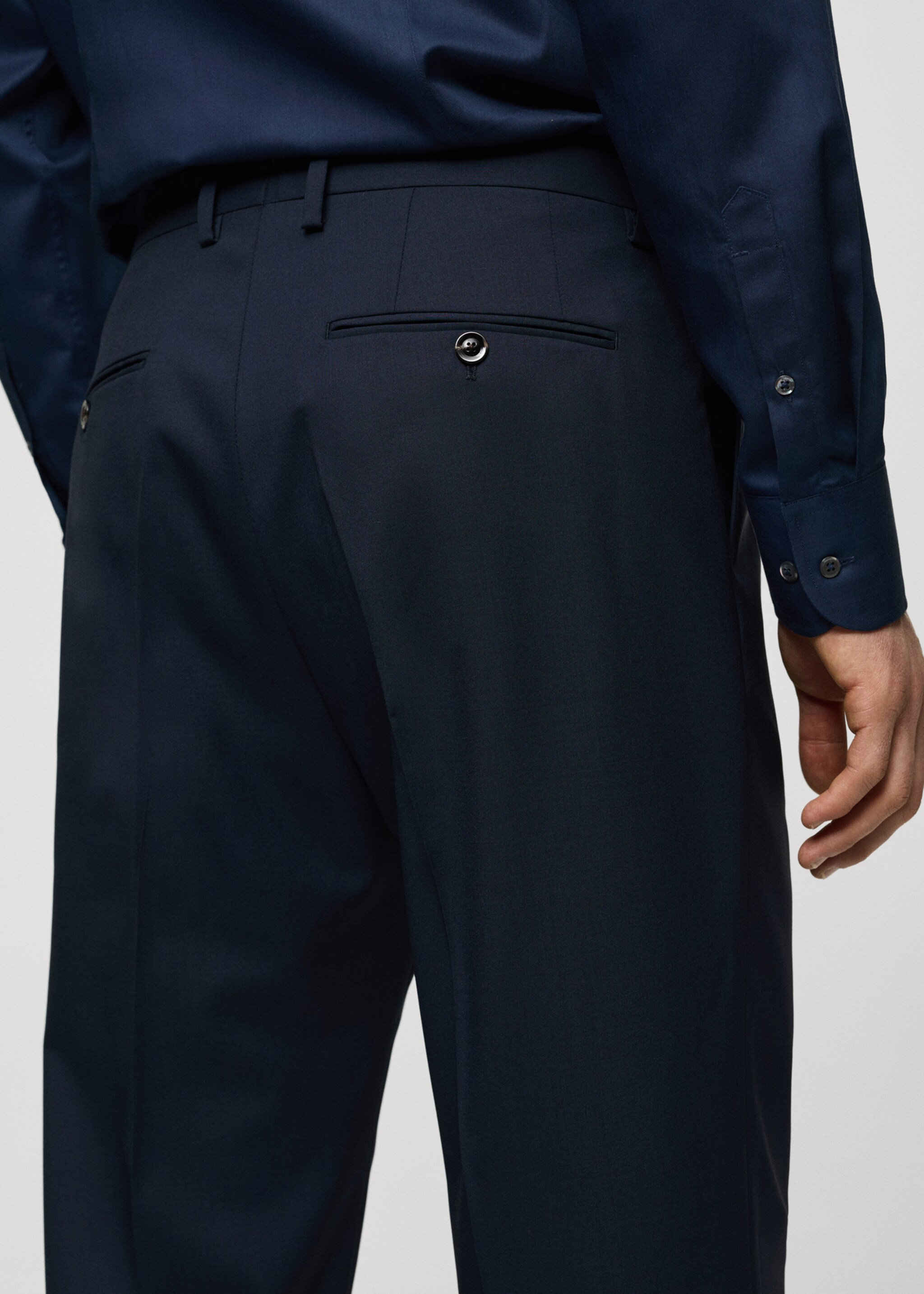100% virgin wool slim-fit suit trousers - Details of the article 6, Dark Navy. Ref: 67018273-00.
