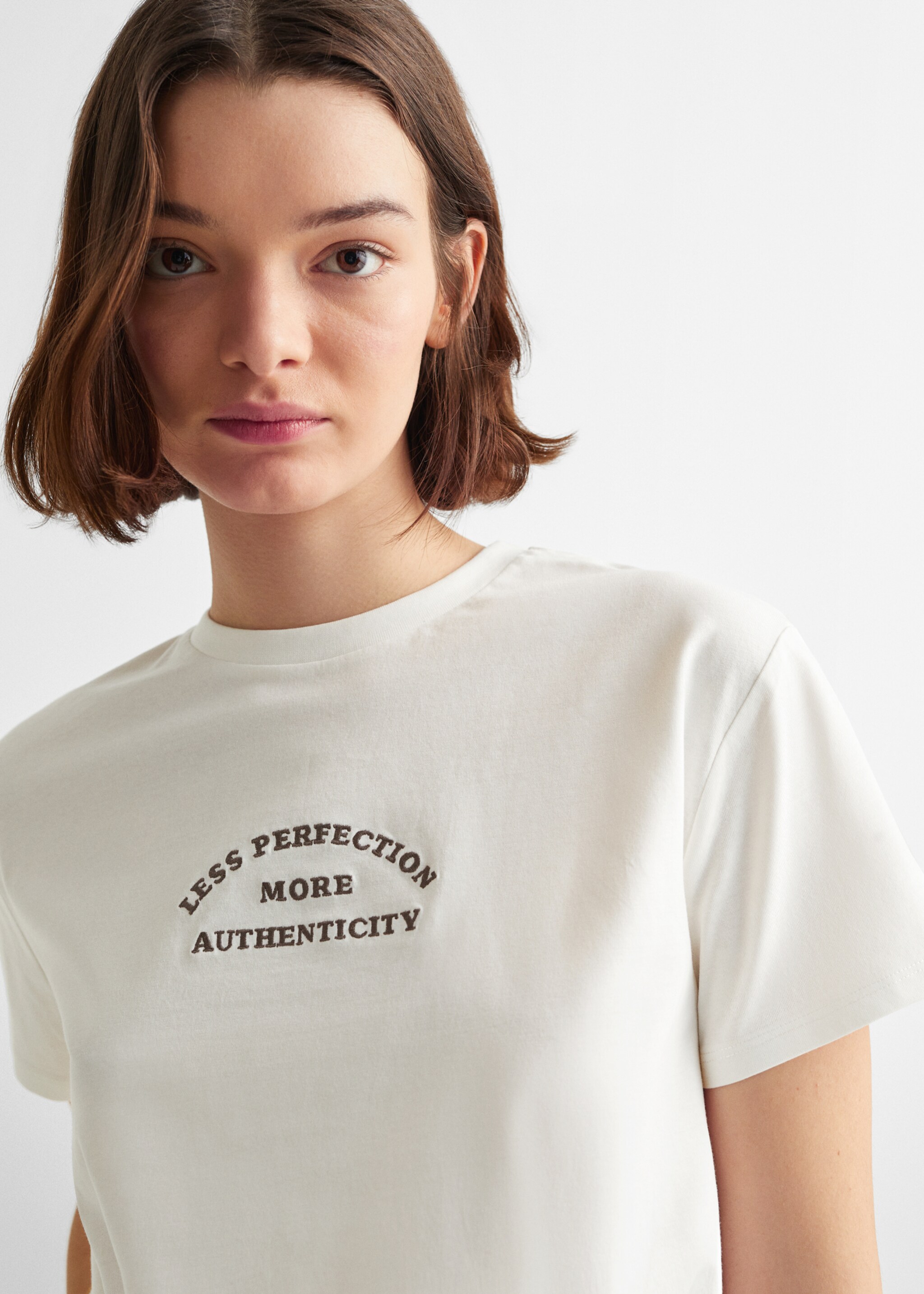 T-shirt met boodschap en knoop - Detail van het artikel 1