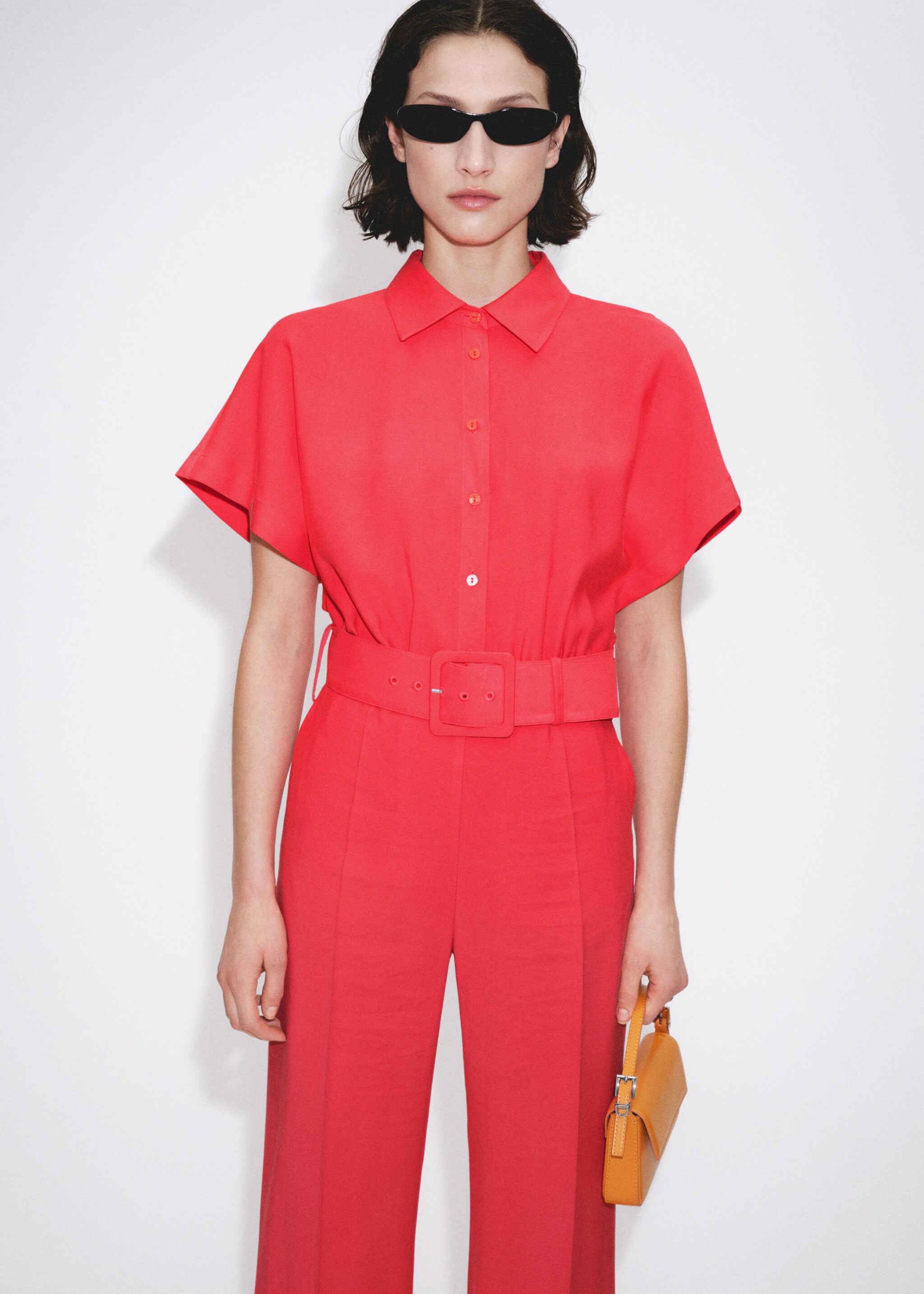Belt long jumpsuit - Details of the article 7, Coral Red. Ref: 67025743-00.
